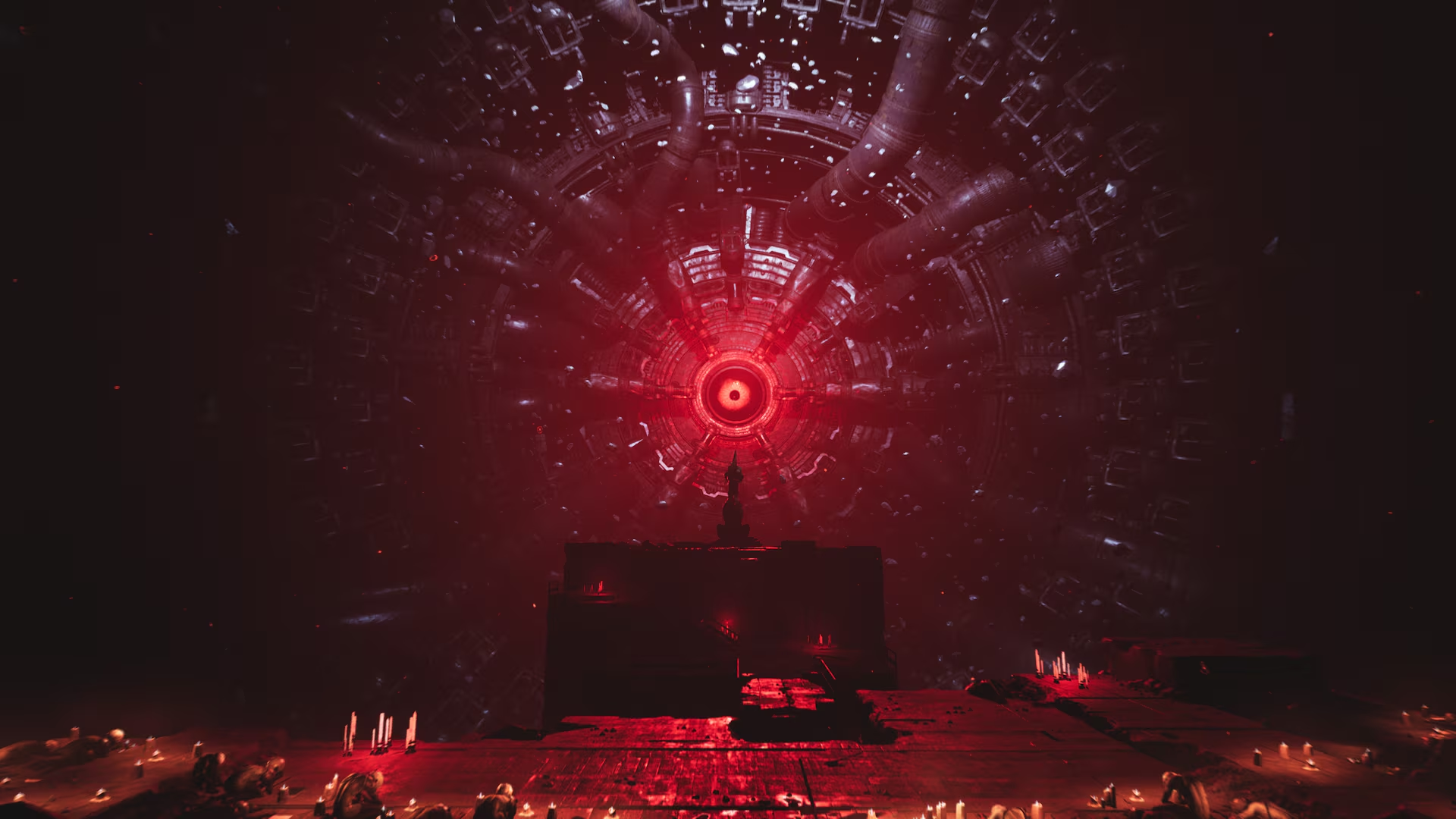 Una massiccia sala macchine illuminata di rosso con un'apertura centrale e una piattaforma in primo piano.
