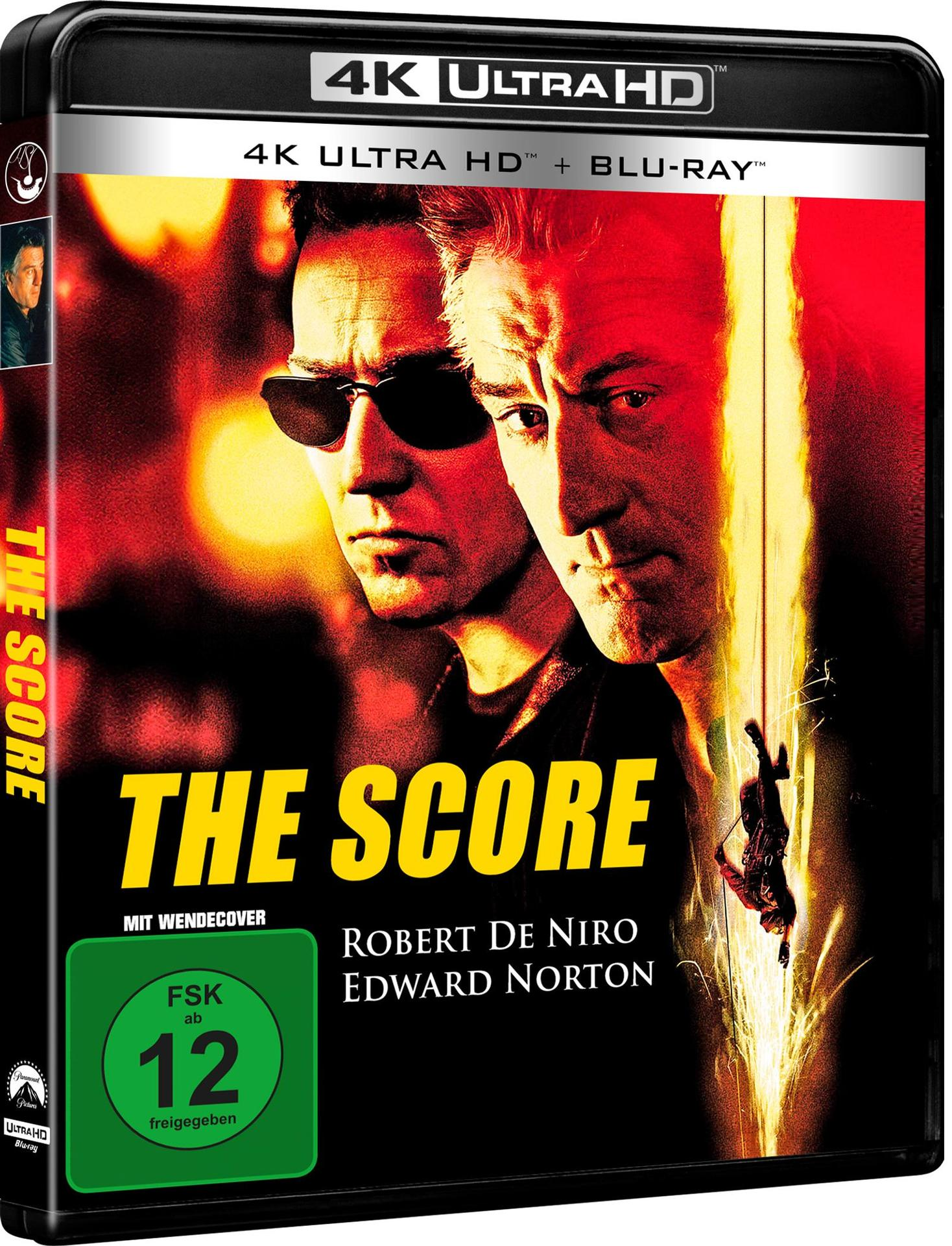 Blu-ray-Hülle des Films 'The Score' mit Robert De Niro und Edward Norton vor rotem Hintergrund.