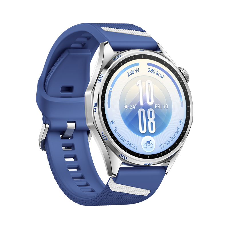 Un reloj inteligente plateado con correa de silicona azul, muestra hora, clima y estadísticas de actividad.