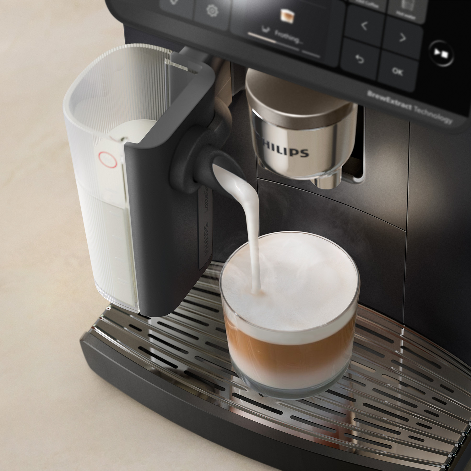 A coffee machine pours milk into a glass with coffee on a drip tray.