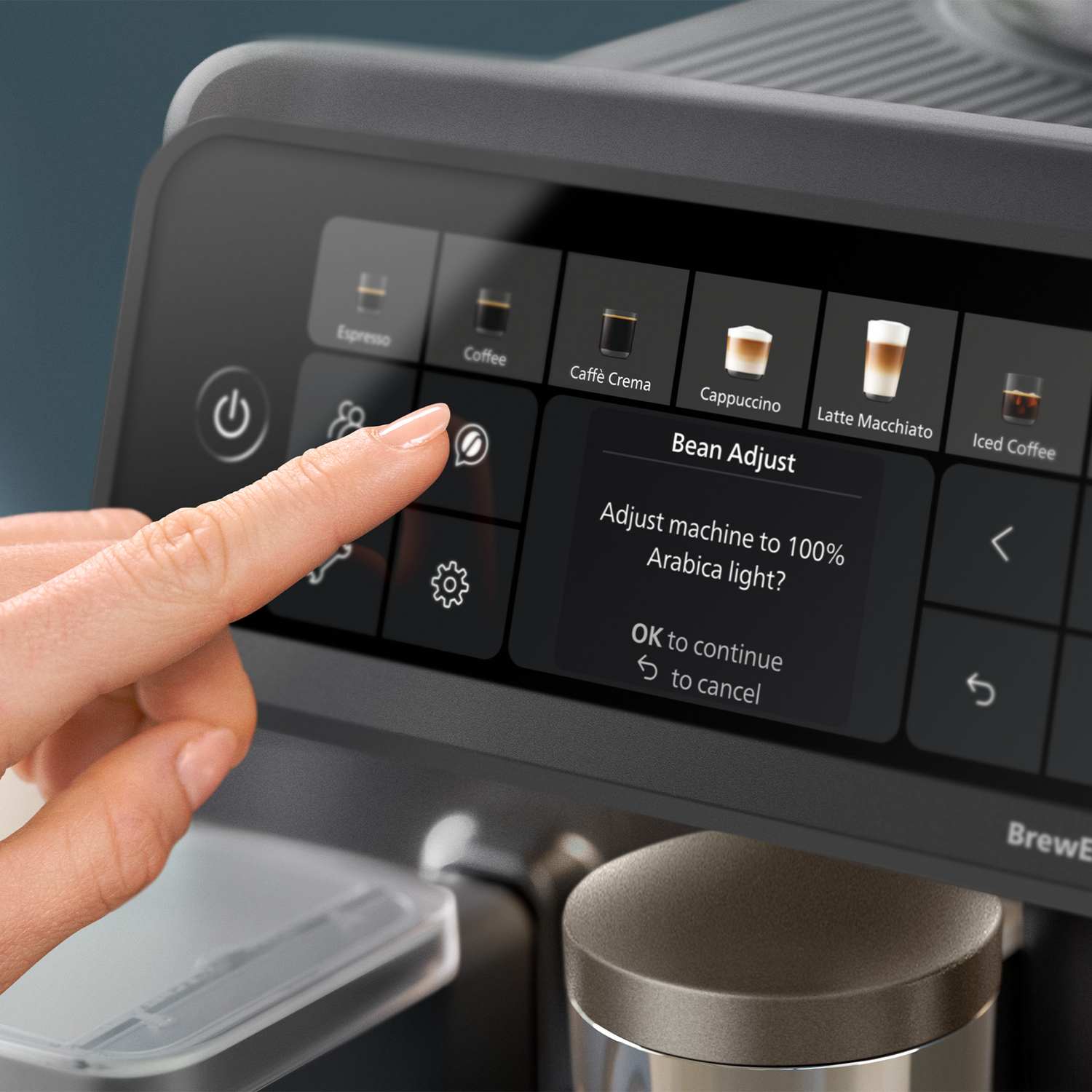 A hand taps the touchscreen of a coffee machine showing a bean adjust menu.