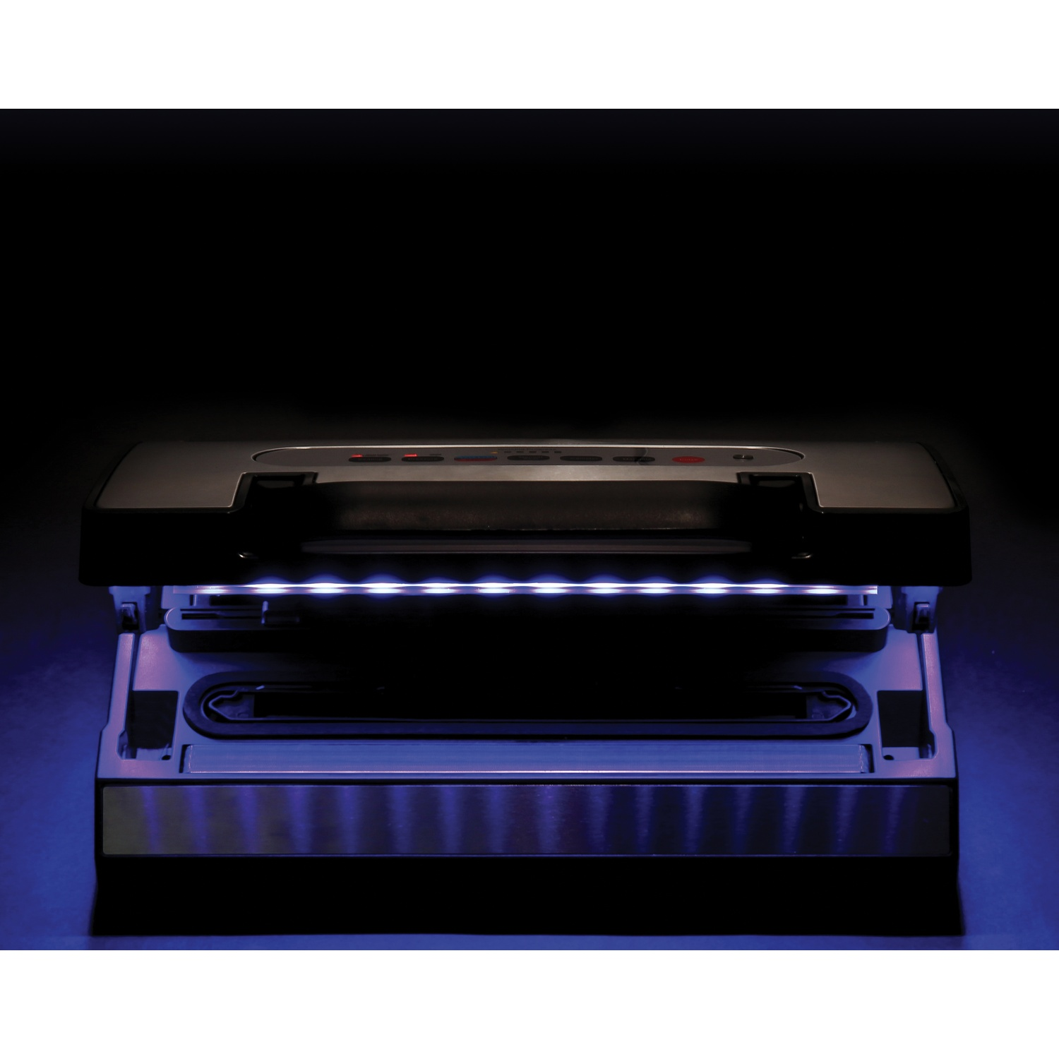 Una macchina sottovuoto con illuminazione a LED blu su sfondo nero.