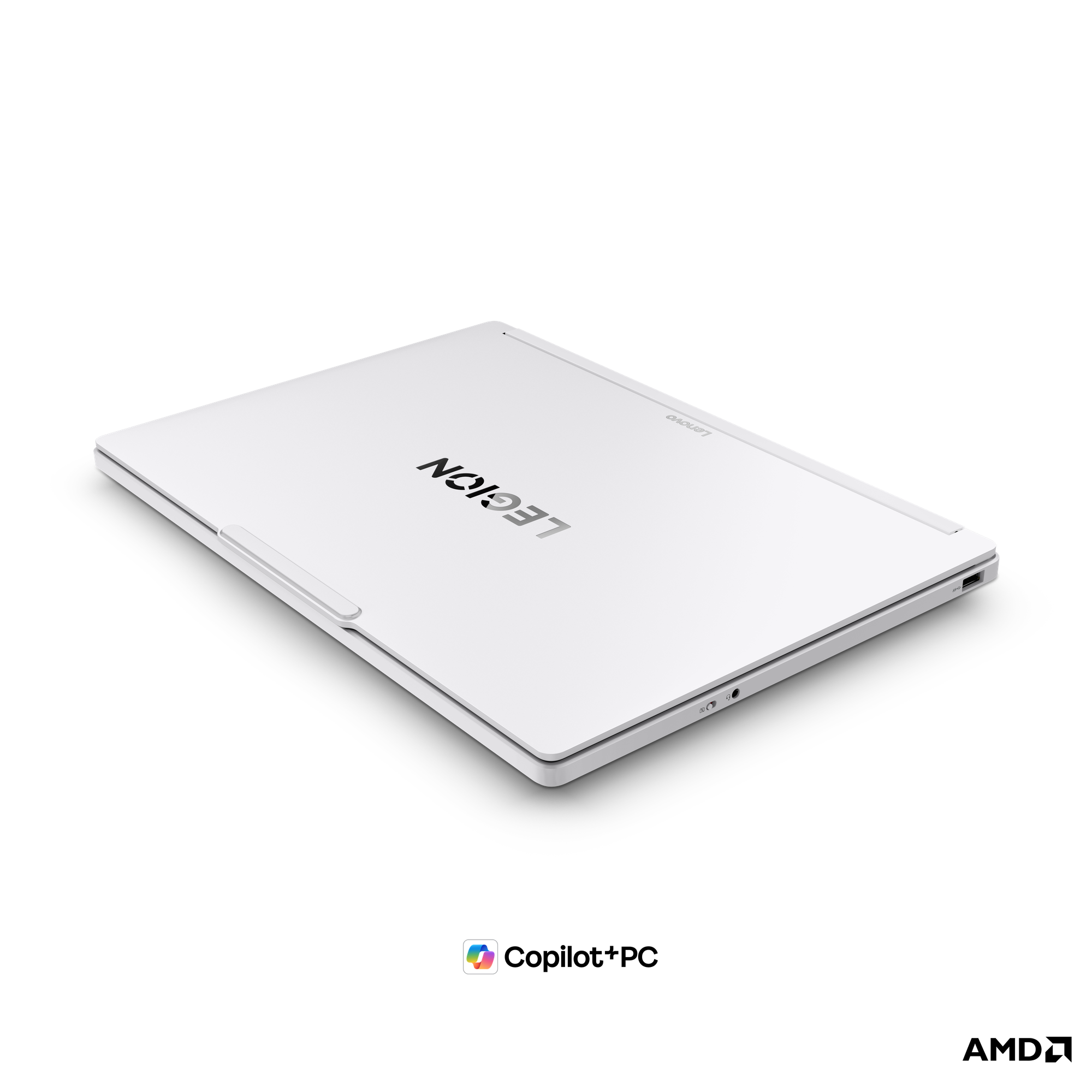 Siyah arka plan üzerinde kapalı beyaz bir Lenovo Legion dizüstü bilgisayar.