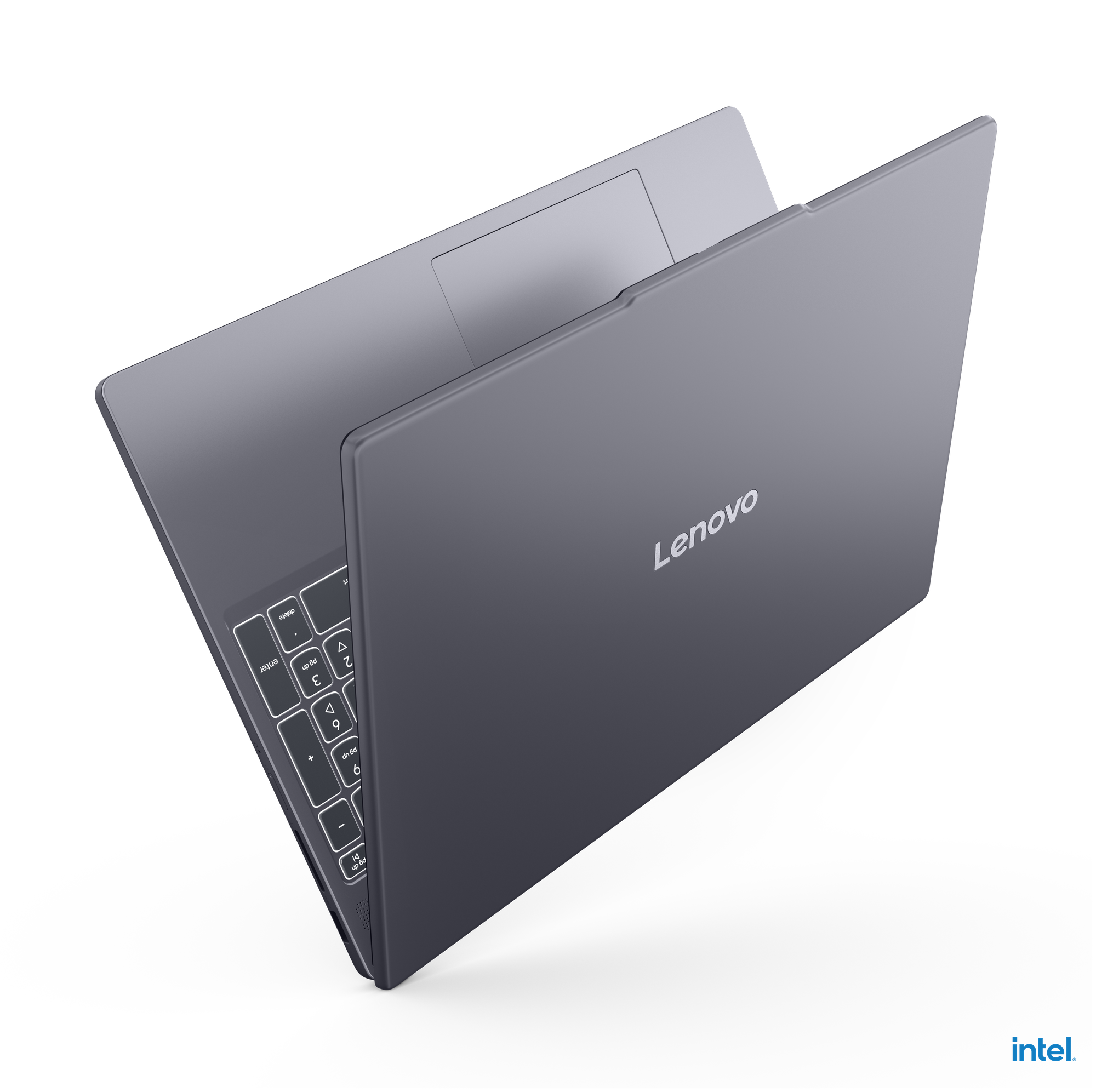 Gri renkli bir Lenovo dizüstü bilgisayar siyah arka planda yarı açık duruyor, klavye ve Intel logosu görünüyor.