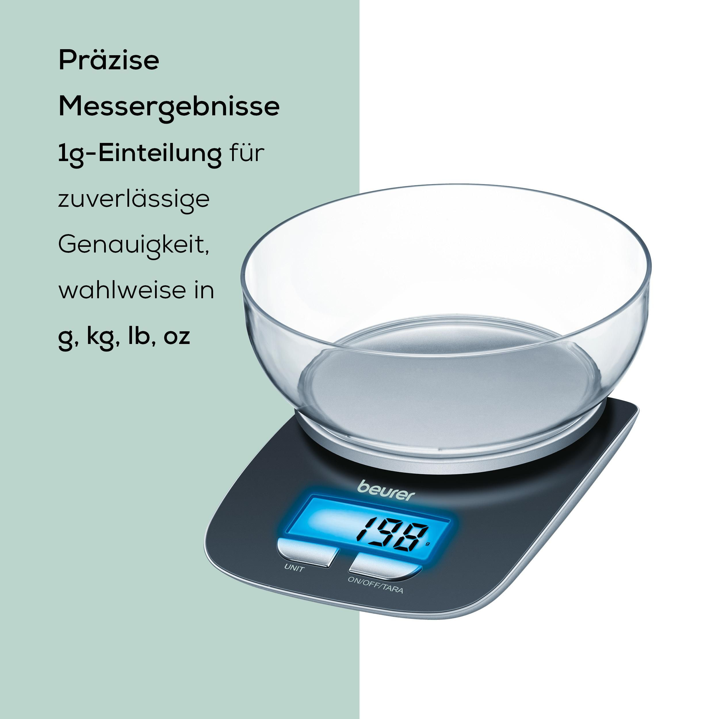 Balance de cuisine numérique noire avec bol en verre et écran bleu.