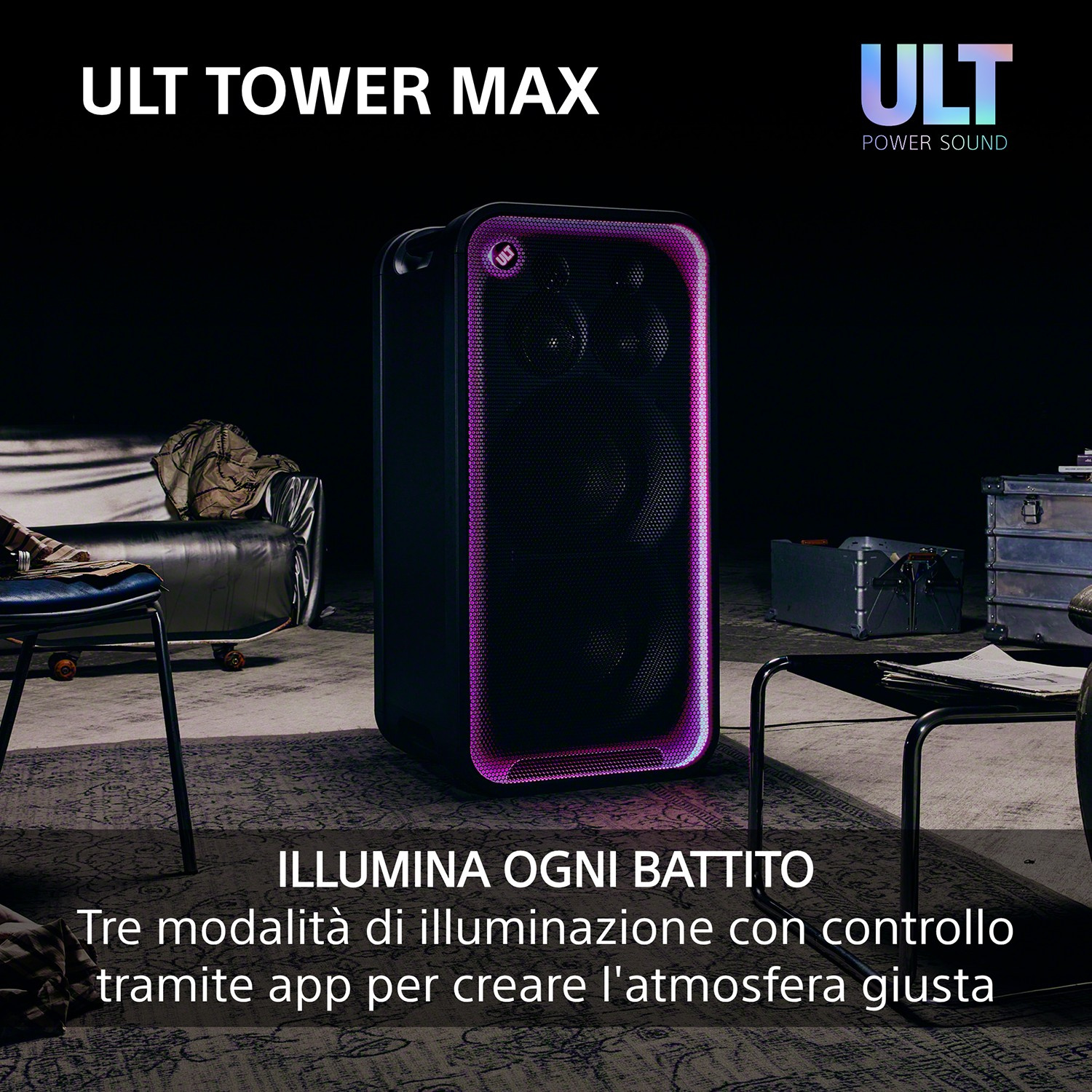 Un altoparlante ULT Tower Max nero con luci LED viola in una stanza buia.