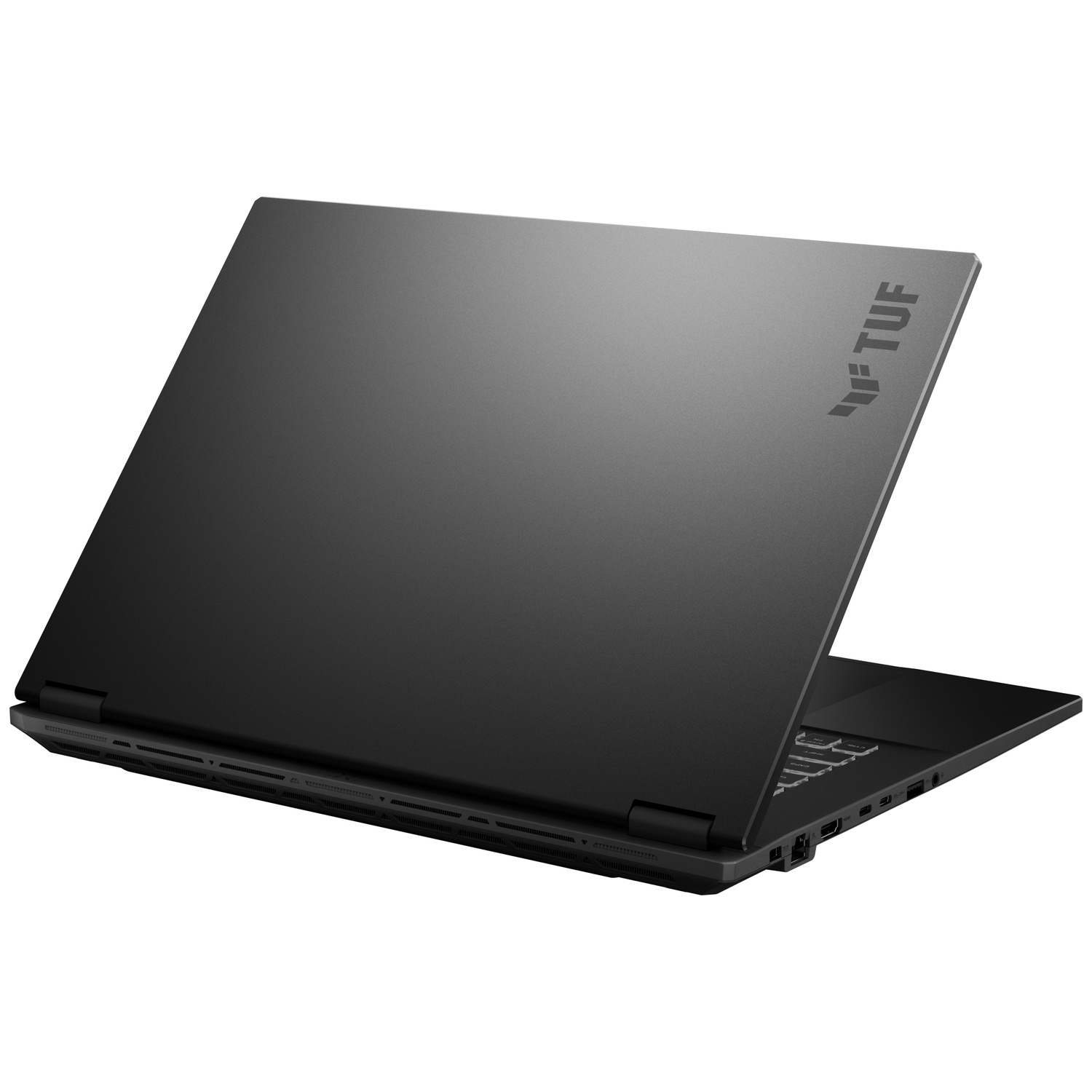 A gray TUF gaming laptop is positioned closed on a white background.