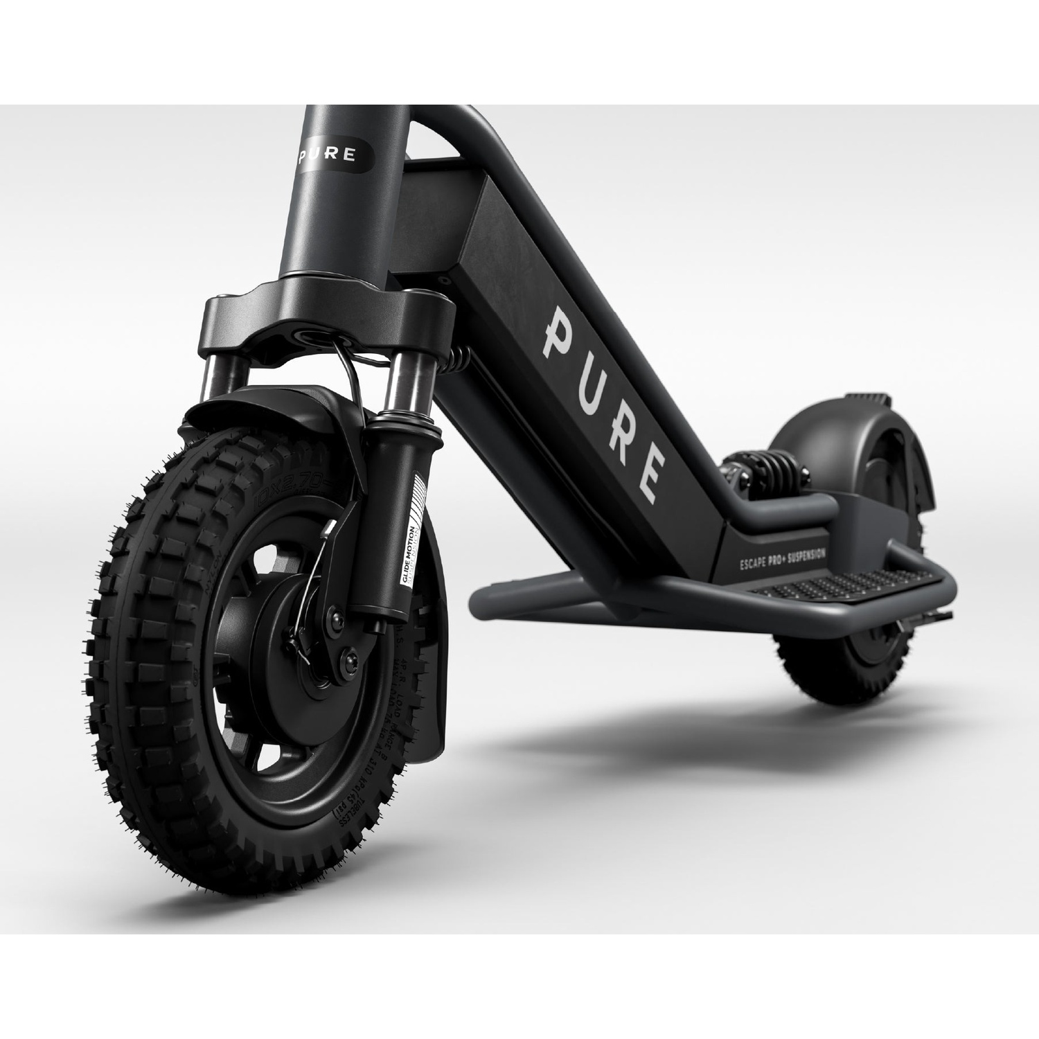 A black Pure electric scooter with knobby tires is positioned on a light surface against a white background.