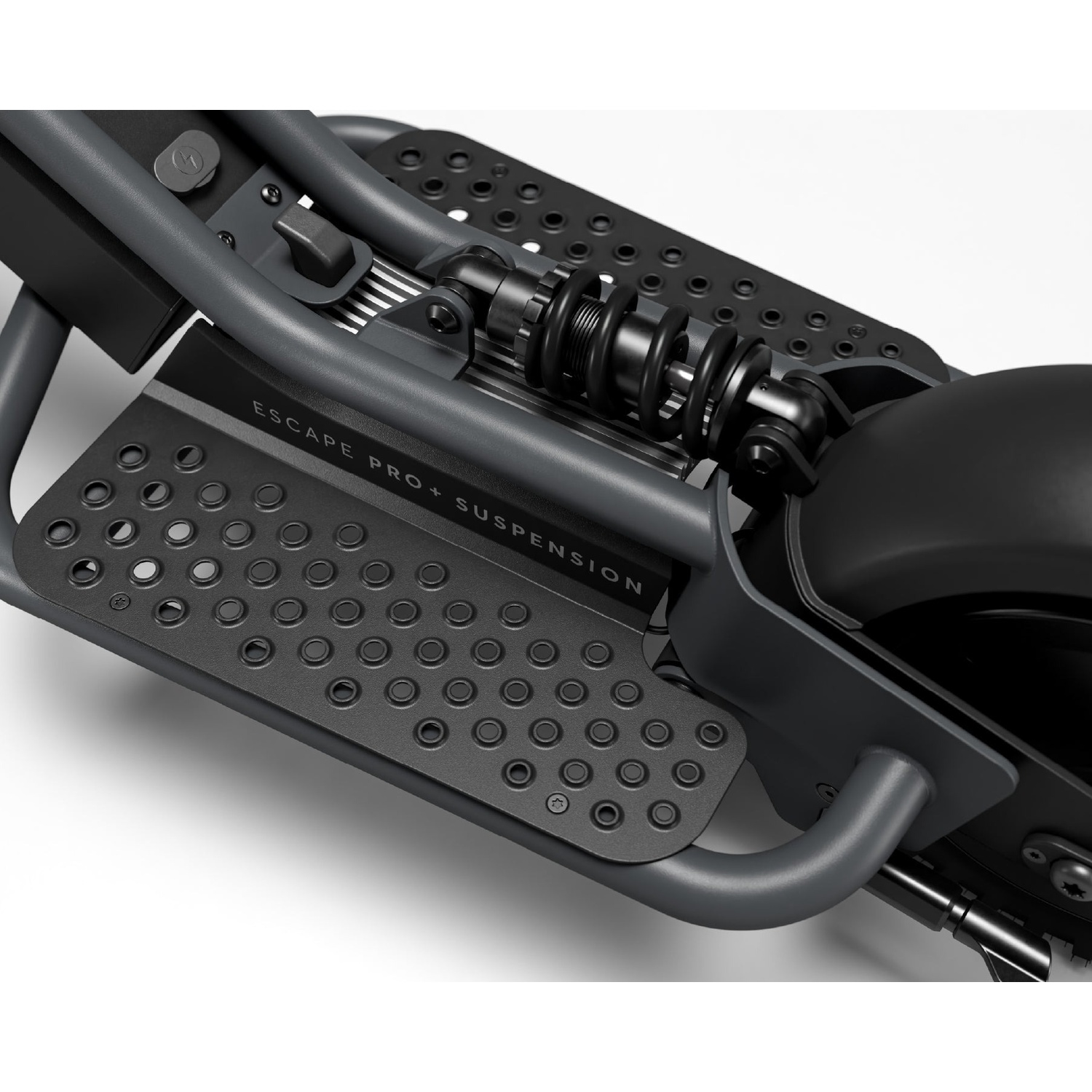 Close-up of a dark grey electric scooter frame showing the footboard with grip holes, suspension spring, and branding.