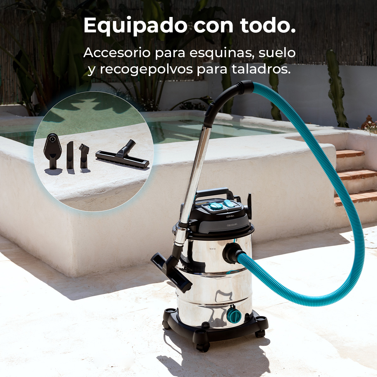 Aspiradora industrial con manguera azul al aire libre, con accesorios en un círculo.