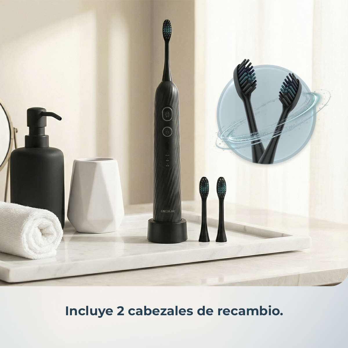 Un cepillo de dientes eléctrico negro con accesorios en una bandeja en un baño.