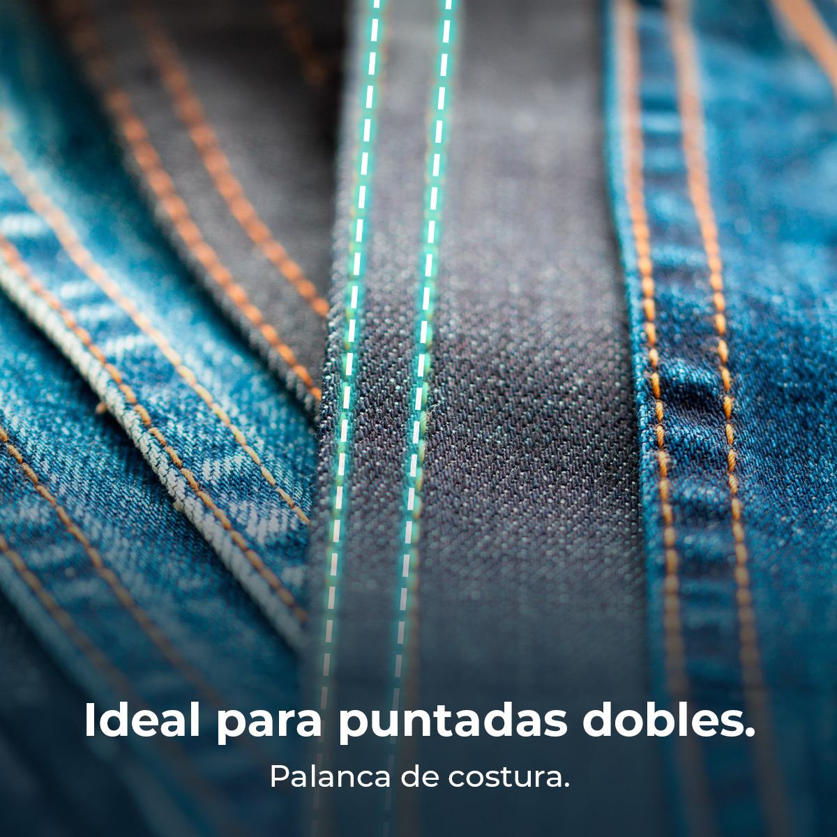 Primer plano de tela vaquera con costuras dobles naranjas y líneas verdes.