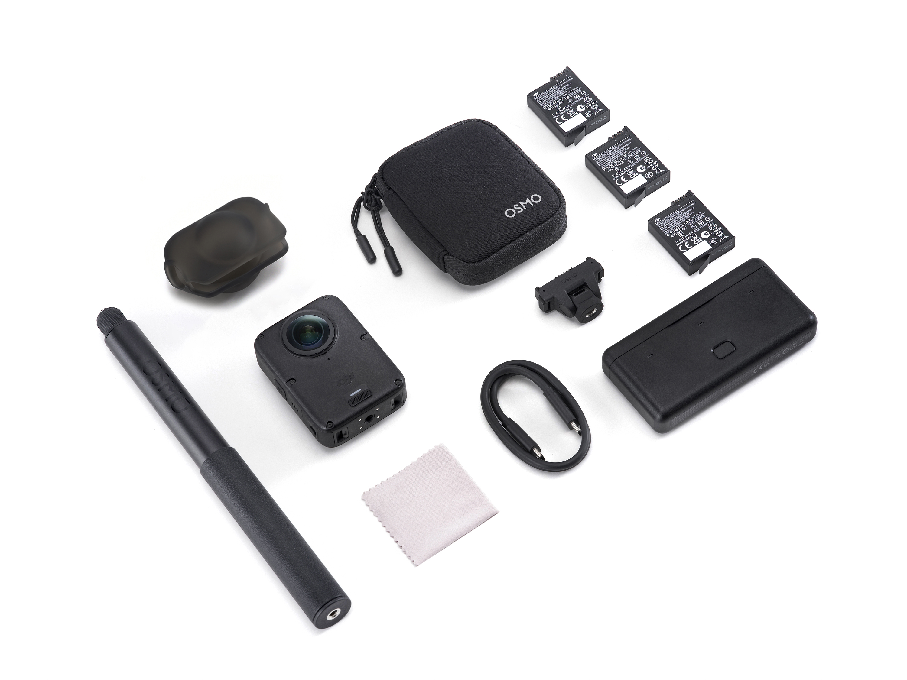 Cámara DJI Osmo con palo selfie, estuche, baterías adicionales, estuche de carga, cable y paño de limpieza.