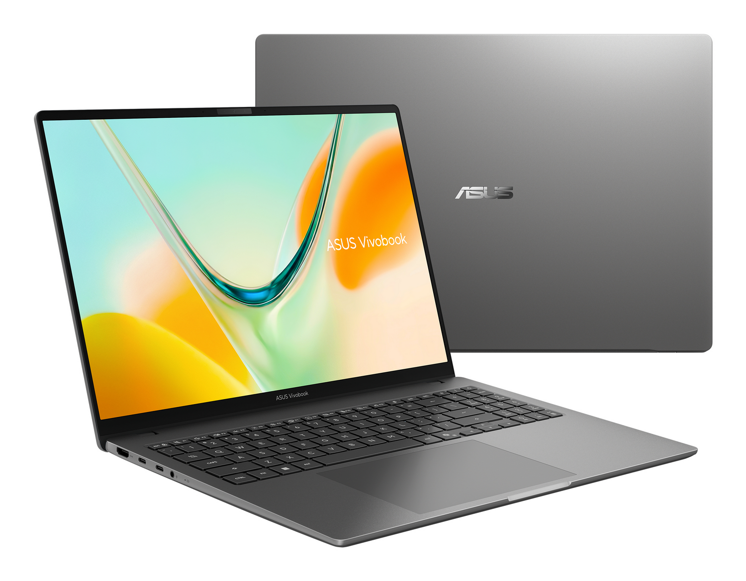 Portátil gris Asus Vivobook abierto con pantalla colorida y vista cerrada al fondo.