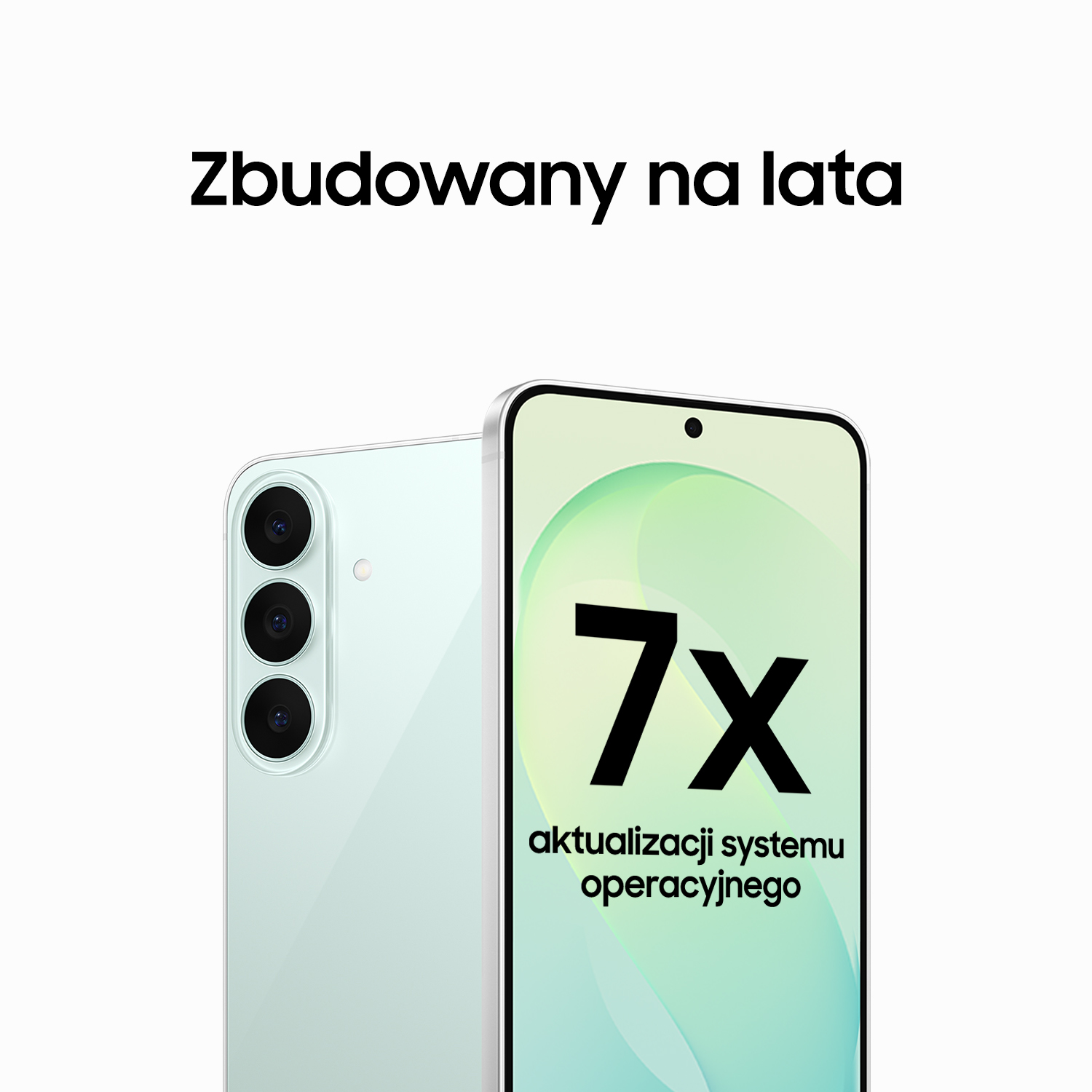 Biały smartfon z zielonym logo 7x i napisem o aktualizacjach systemu na jasnym tle.