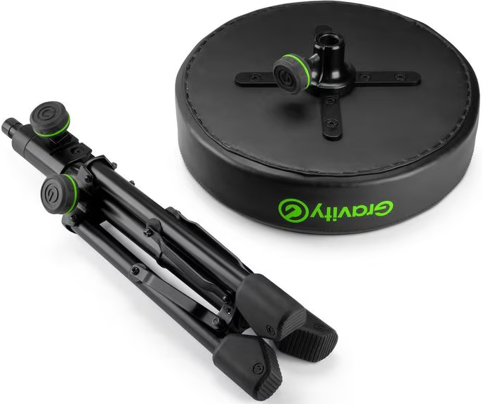 Tabouret de batterie noir avec trépied repliable et logo Gravity vert sur fond blanc.