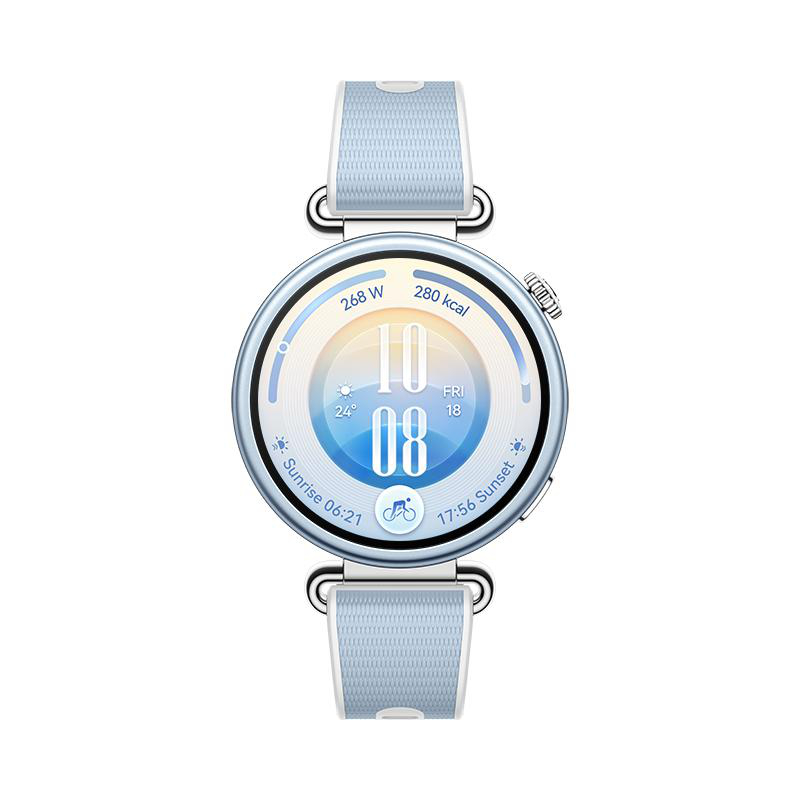 Eine runde Smartwatch mit hellblauem Stoffarmband zeigt das digitale Zifferblatt mit Uhrzeit, Datum und Wetter an.
