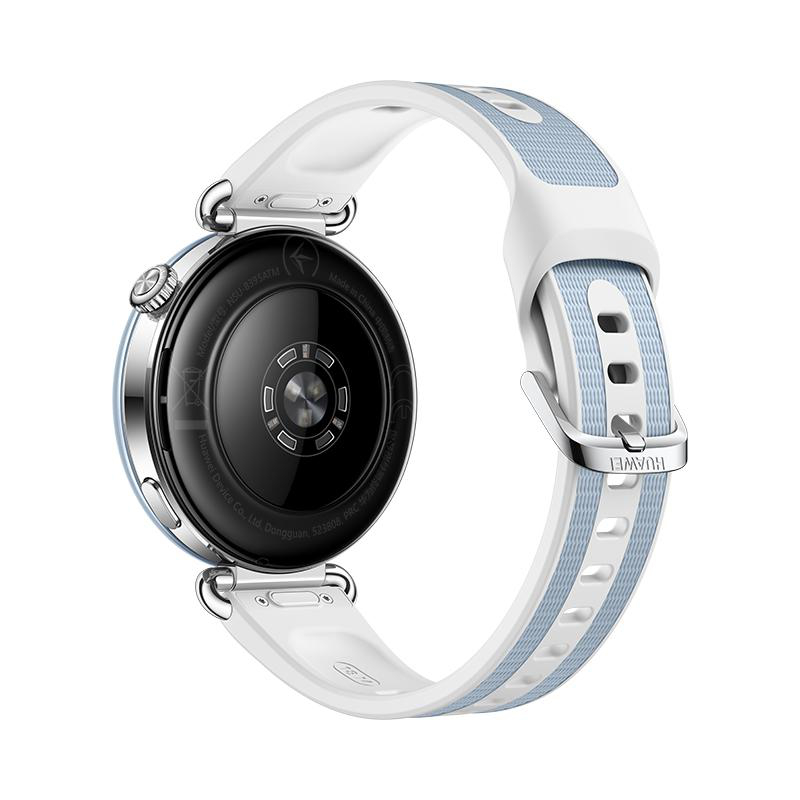 Rückseite einer runden Smartwatch mit schwarzem Gehäuseboden und weiß-blauem Silikonarmband auf weißem Hintergrund.