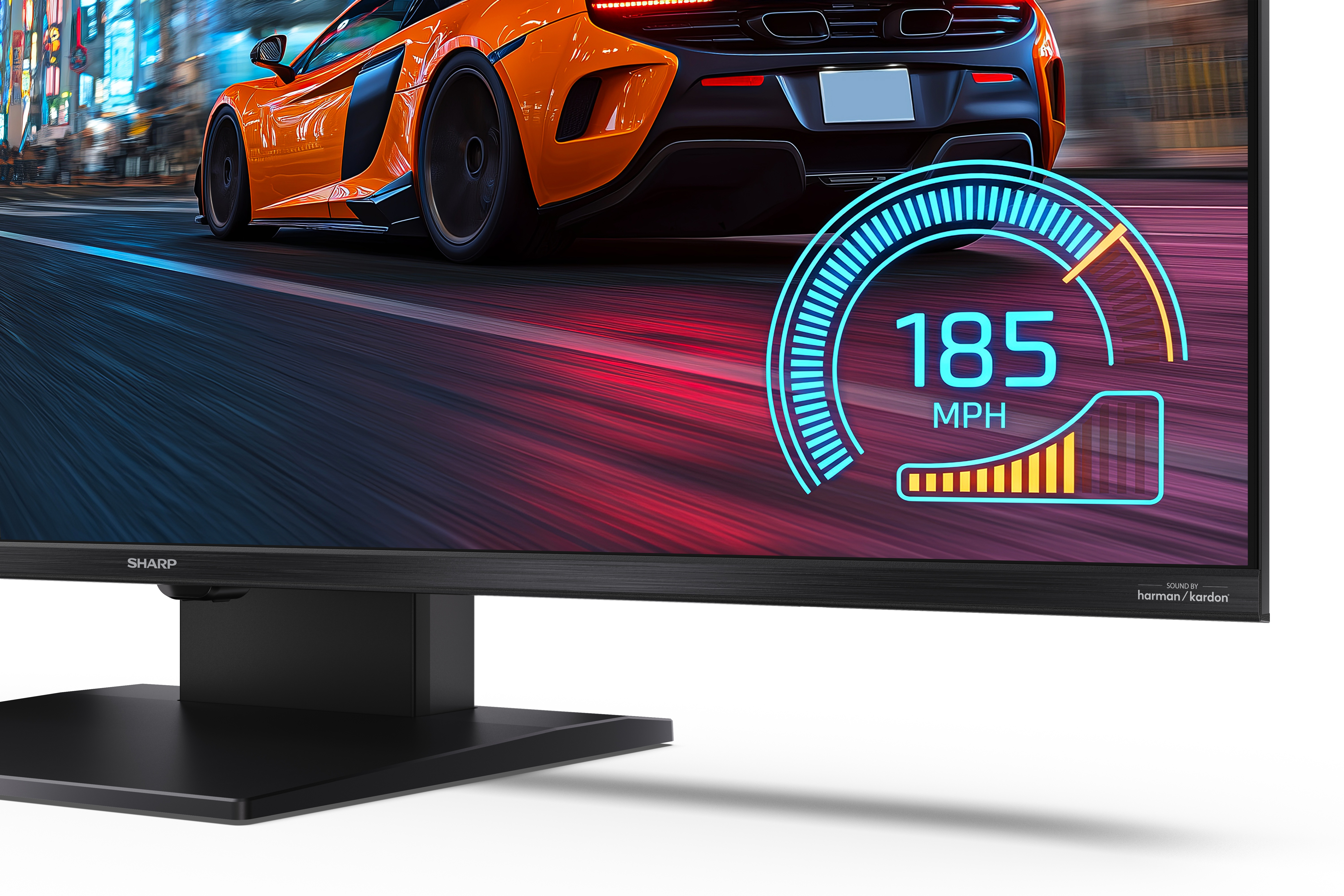 Czarny monitor przedstawia samochód wyścigowy i cyfrowy prędkościomierz 185 MPH.