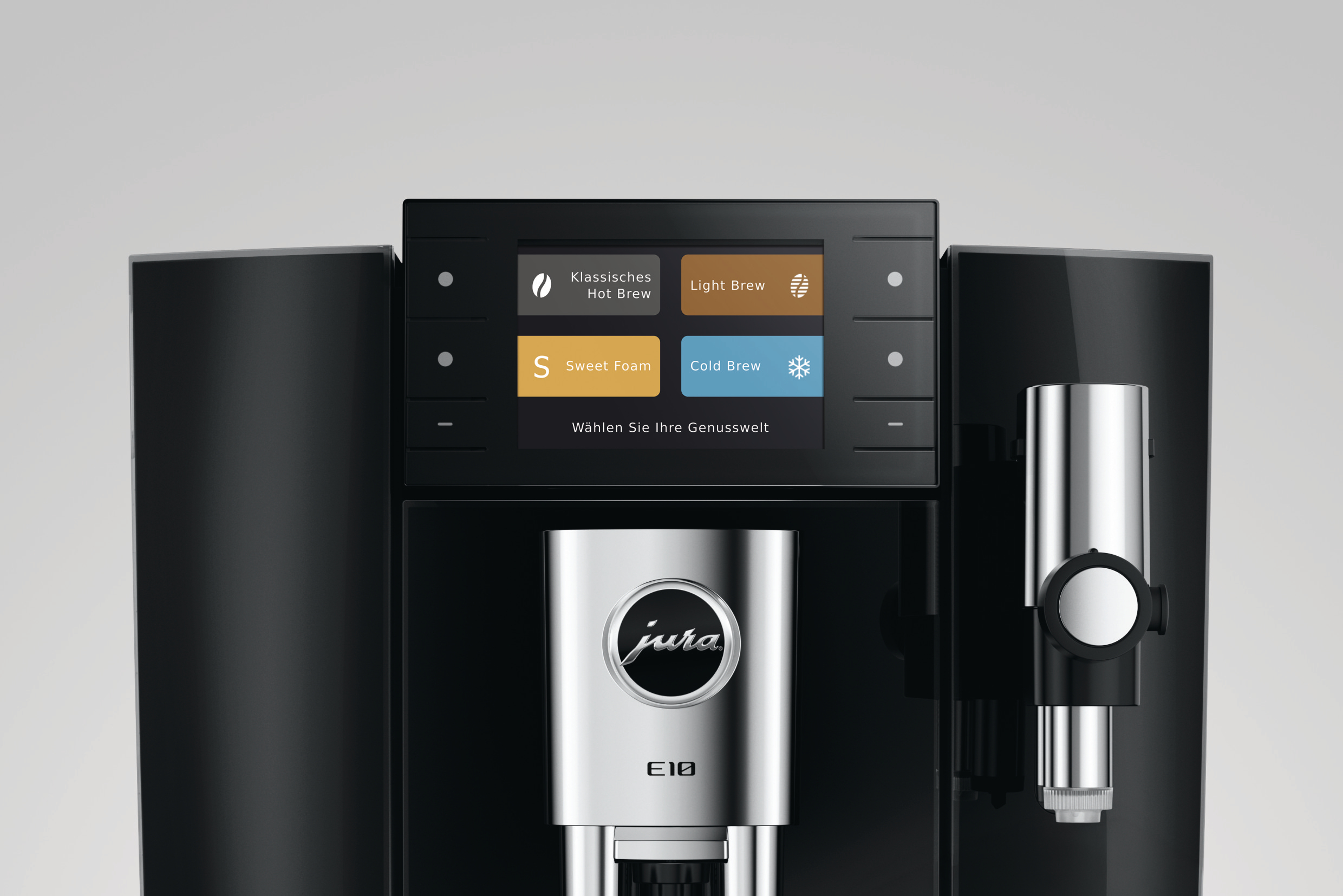 Nahaufnahme einer modernen schwarzen und chromfarbenen Jura E10 Kaffeemaschine mit einem Touchscreen.