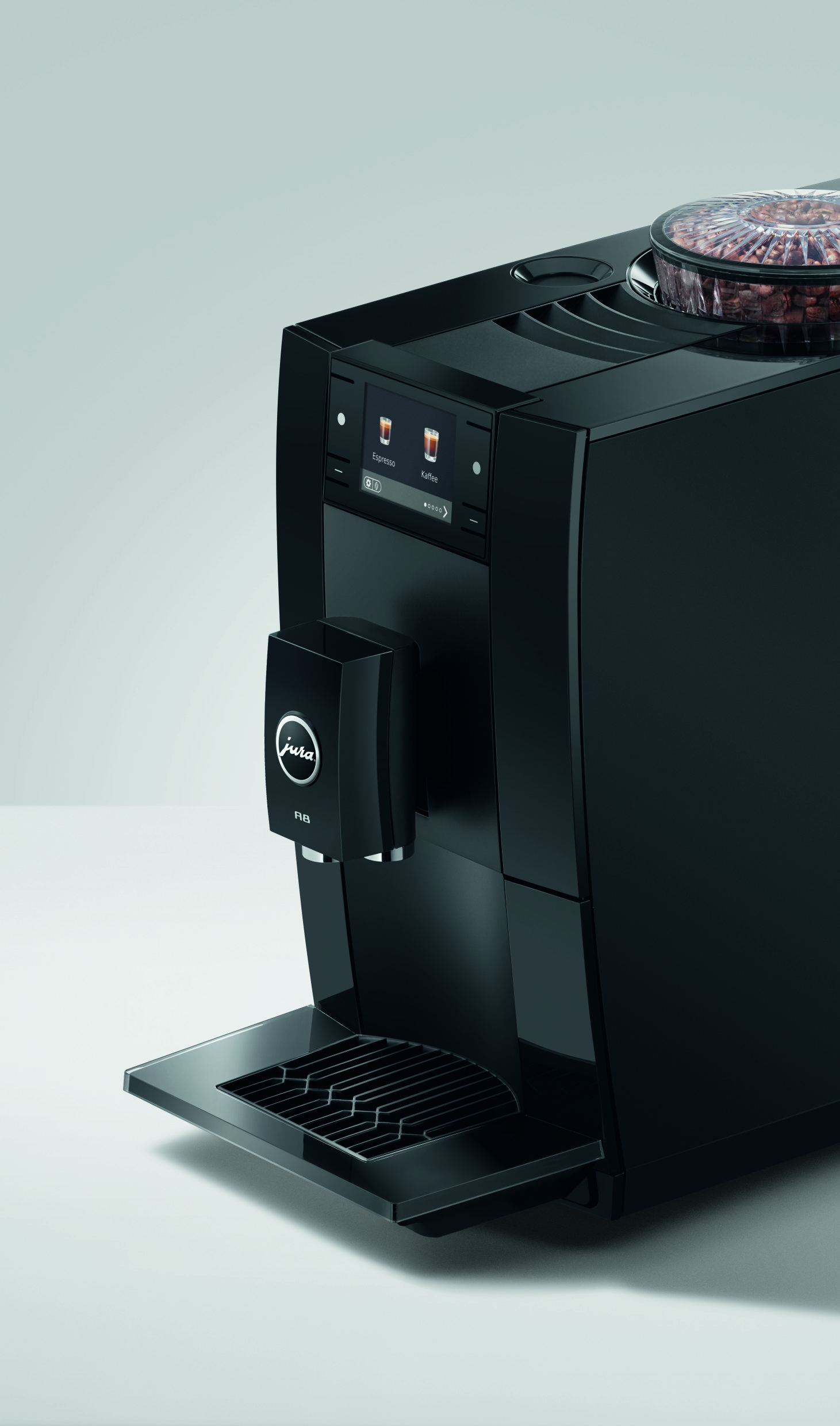 Moderne schwarze Jura Kaffeemaschine mit Display und Bohnenbehälter.