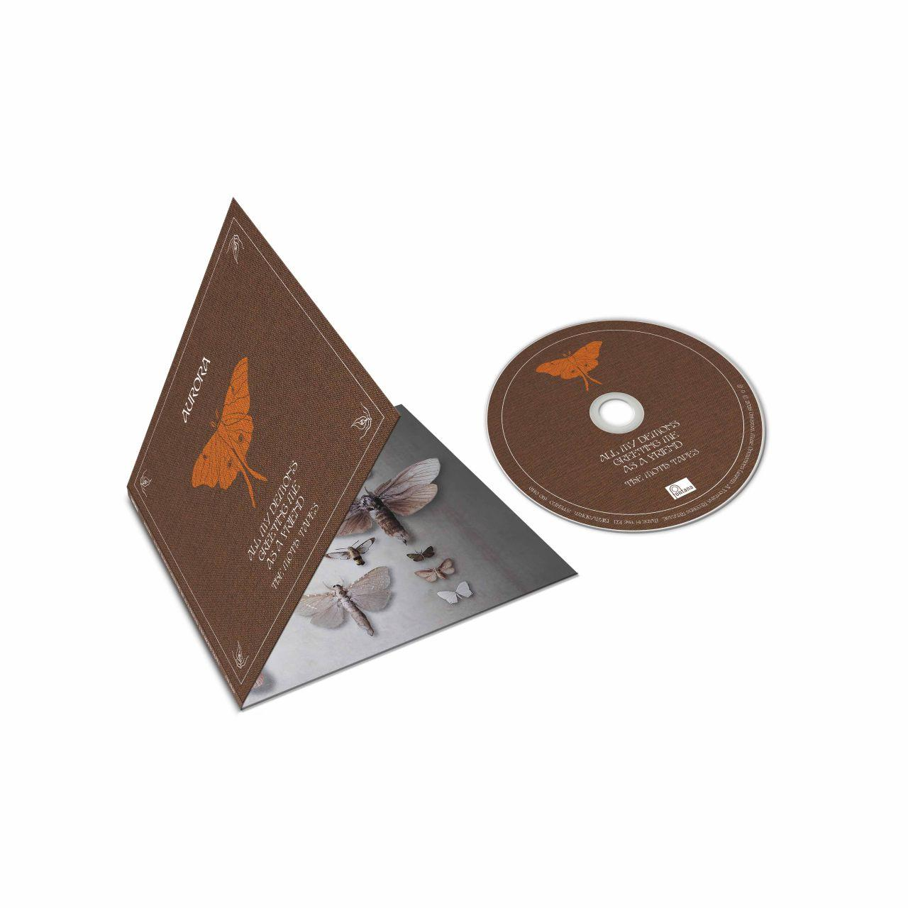 CD und braune dreieckige Hülle mit Mottenmotiven und dem Text 'All My Demons Greeting Me as a Friend'.