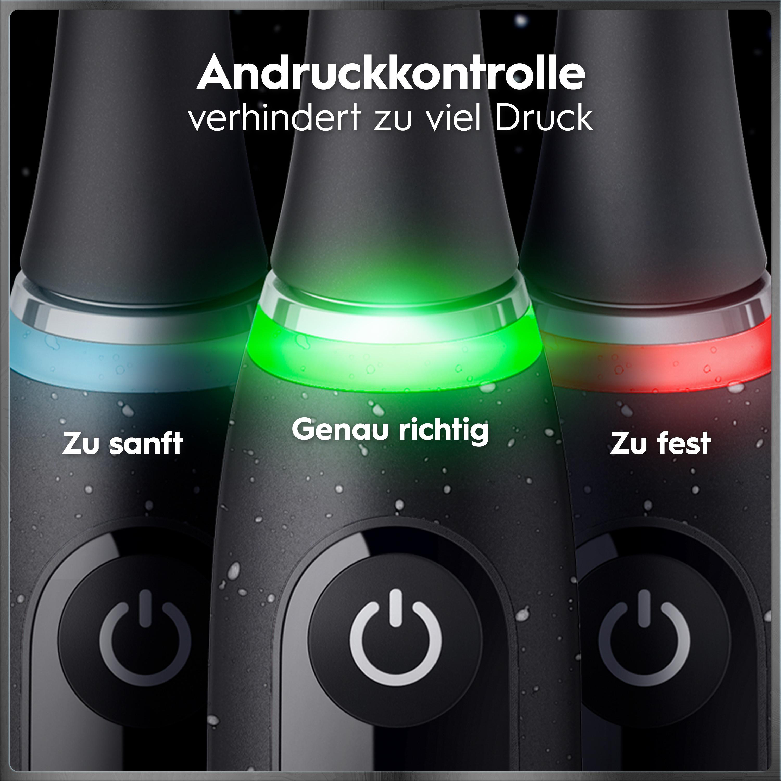 Drei schwarze Zahnbürsten mit Leuchtringen in Blau, Grün und Rot zeigen den Druck an.