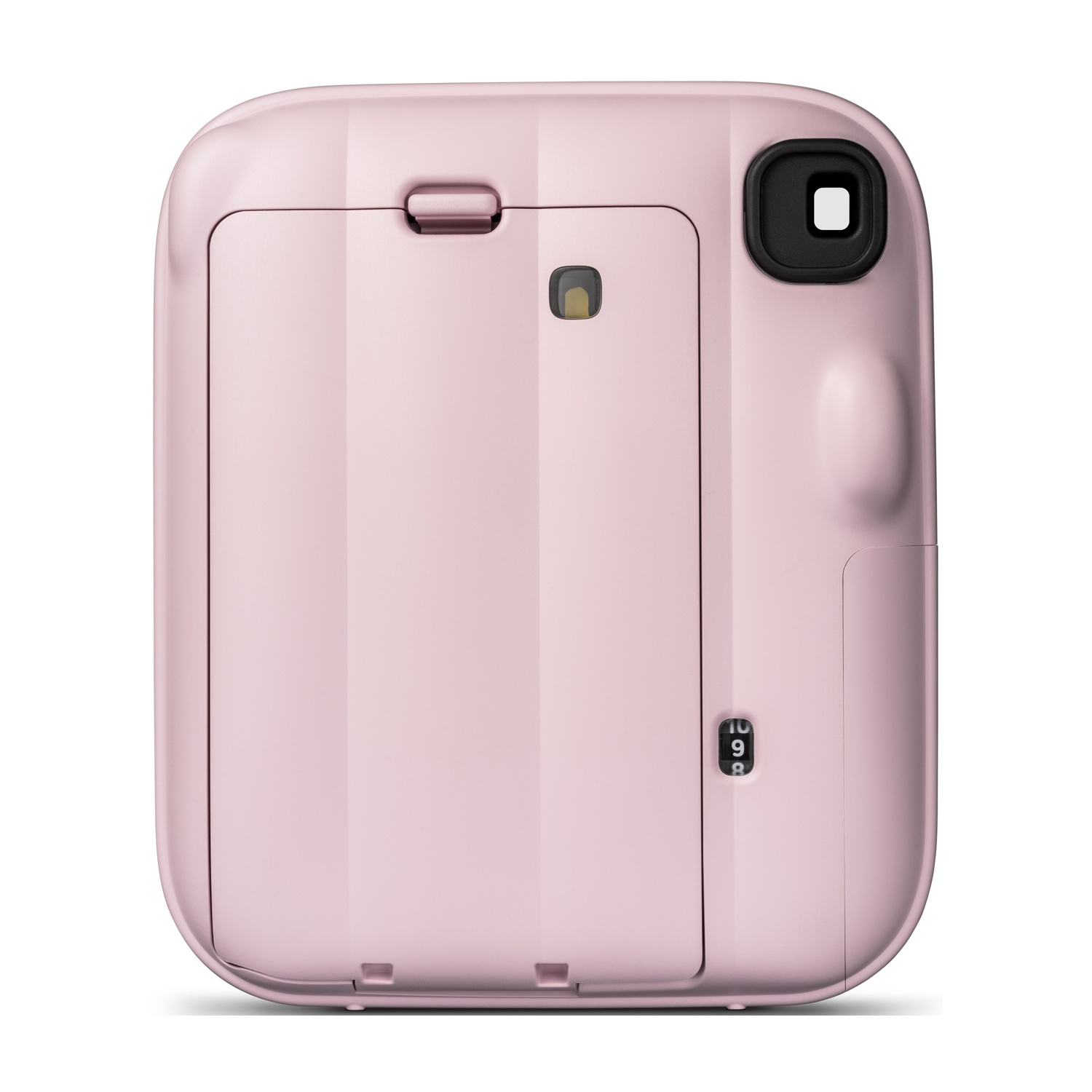 Retro di una fotocamera istantanea rosa con mirino nero e piccolo contatore.