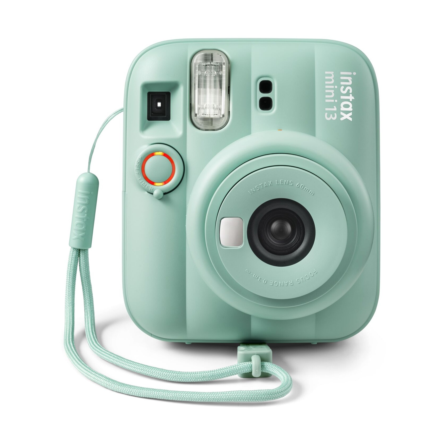 Una fotocamera istantanea Instax Mini 13 verde chiaro con cinturino coordinato su sfondo bianco.