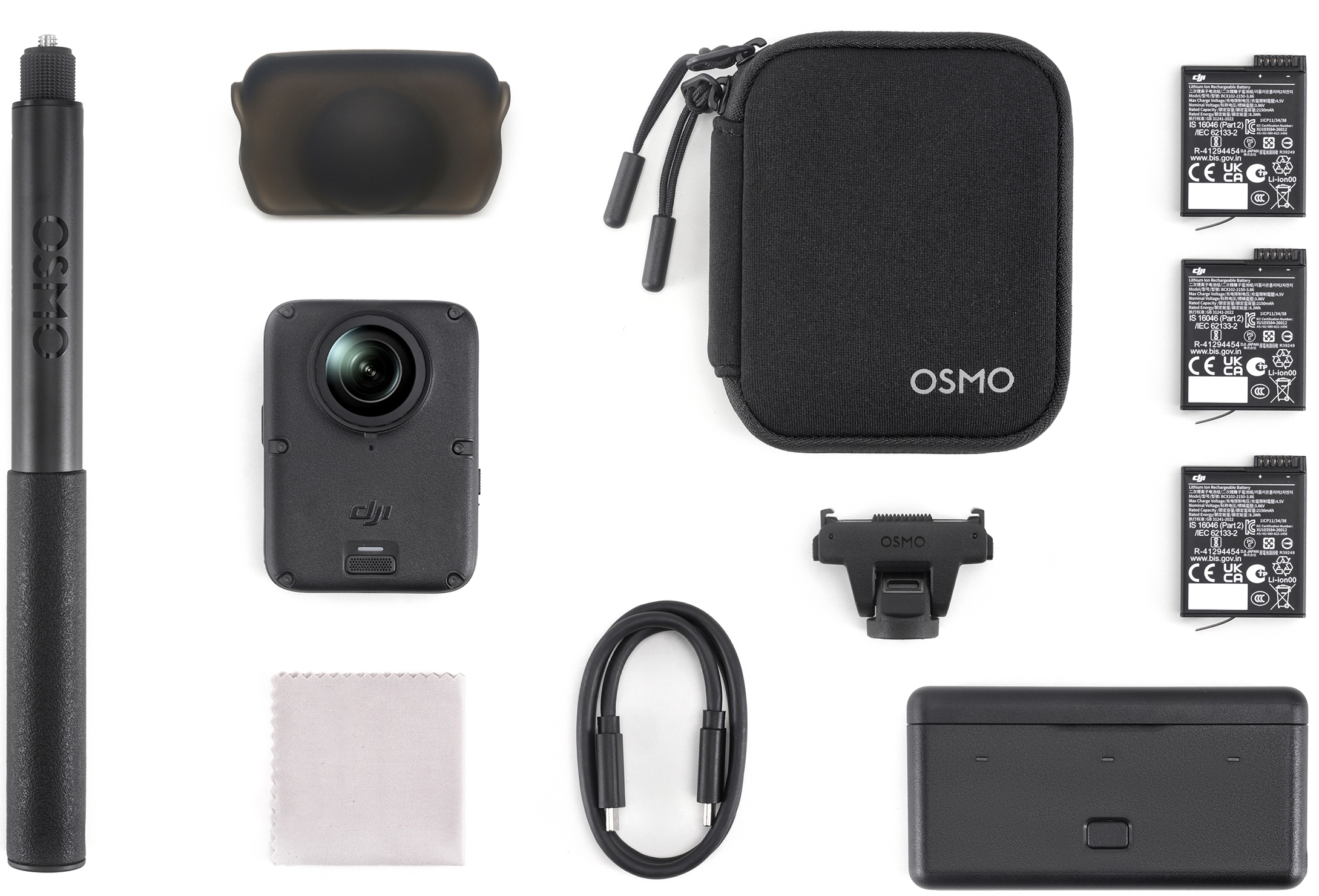 Caméra d'action DJI Osmo avec accessoires dont poignée, étui, batteries, câble et sacoche sur fond blanc.