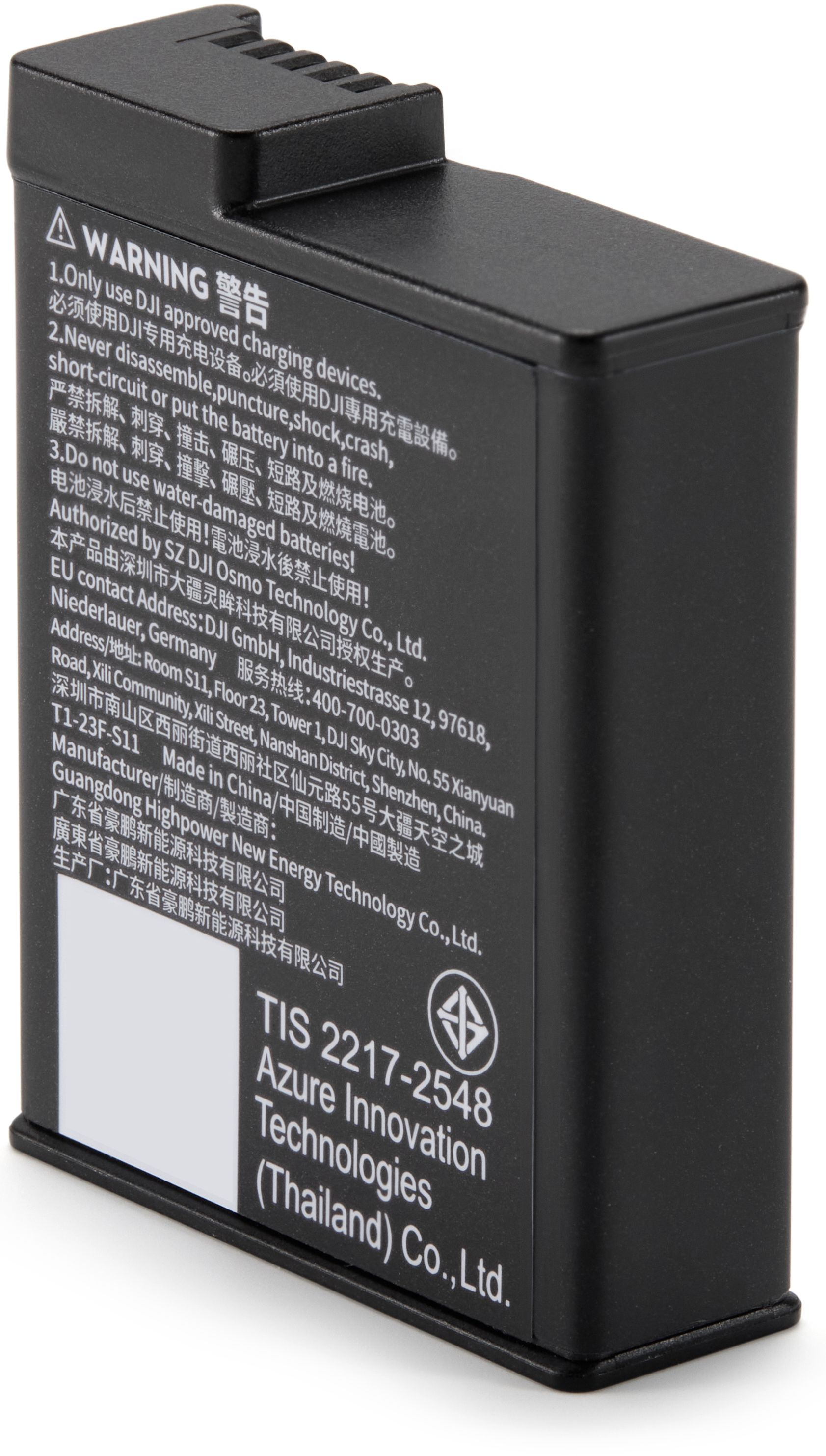 Batterie DJI noire affichant des étiquettes d'avertissement et des infos.