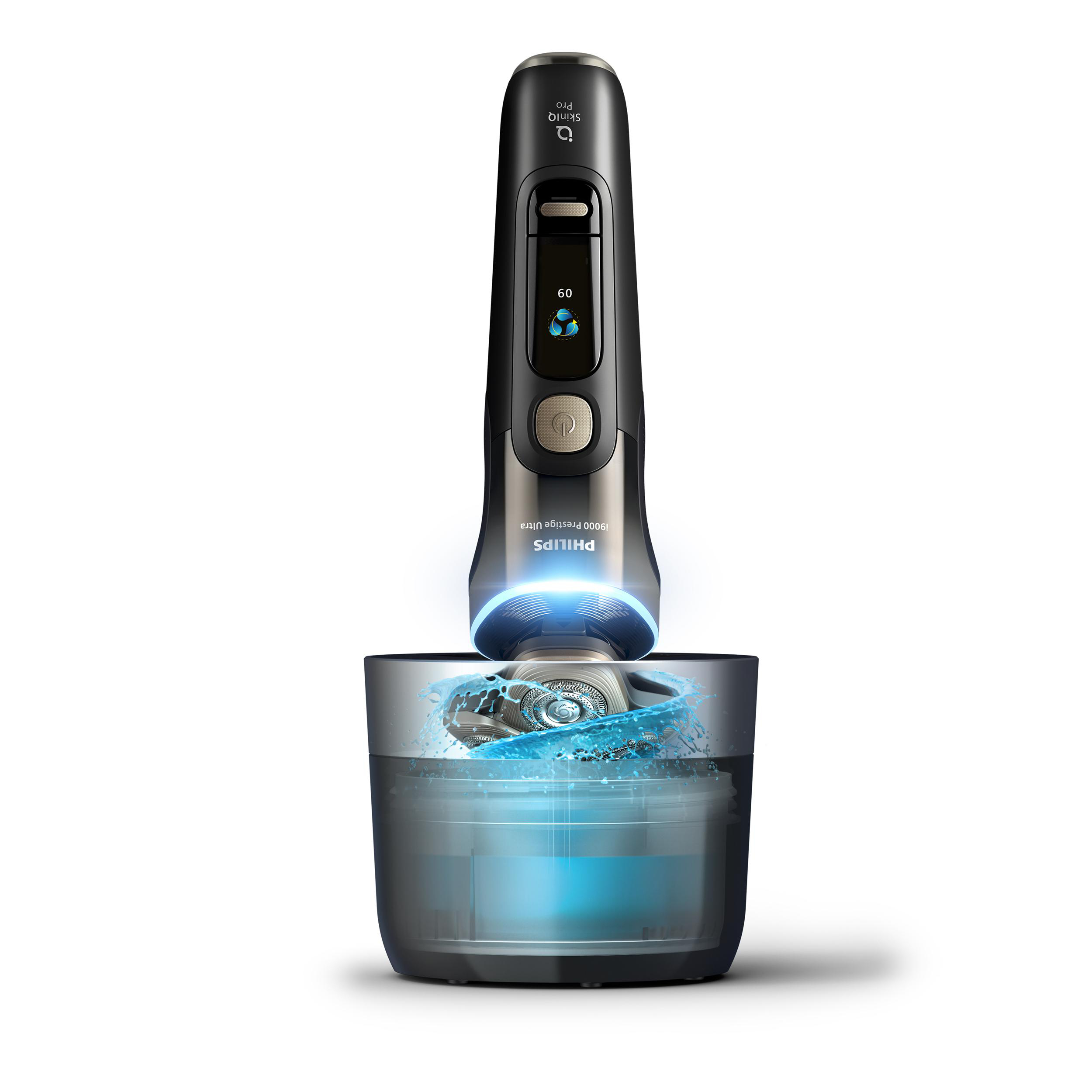 Ein Philips Rasierer steht vertikal in einer reinigenden Wasserstation mit blauem Licht.