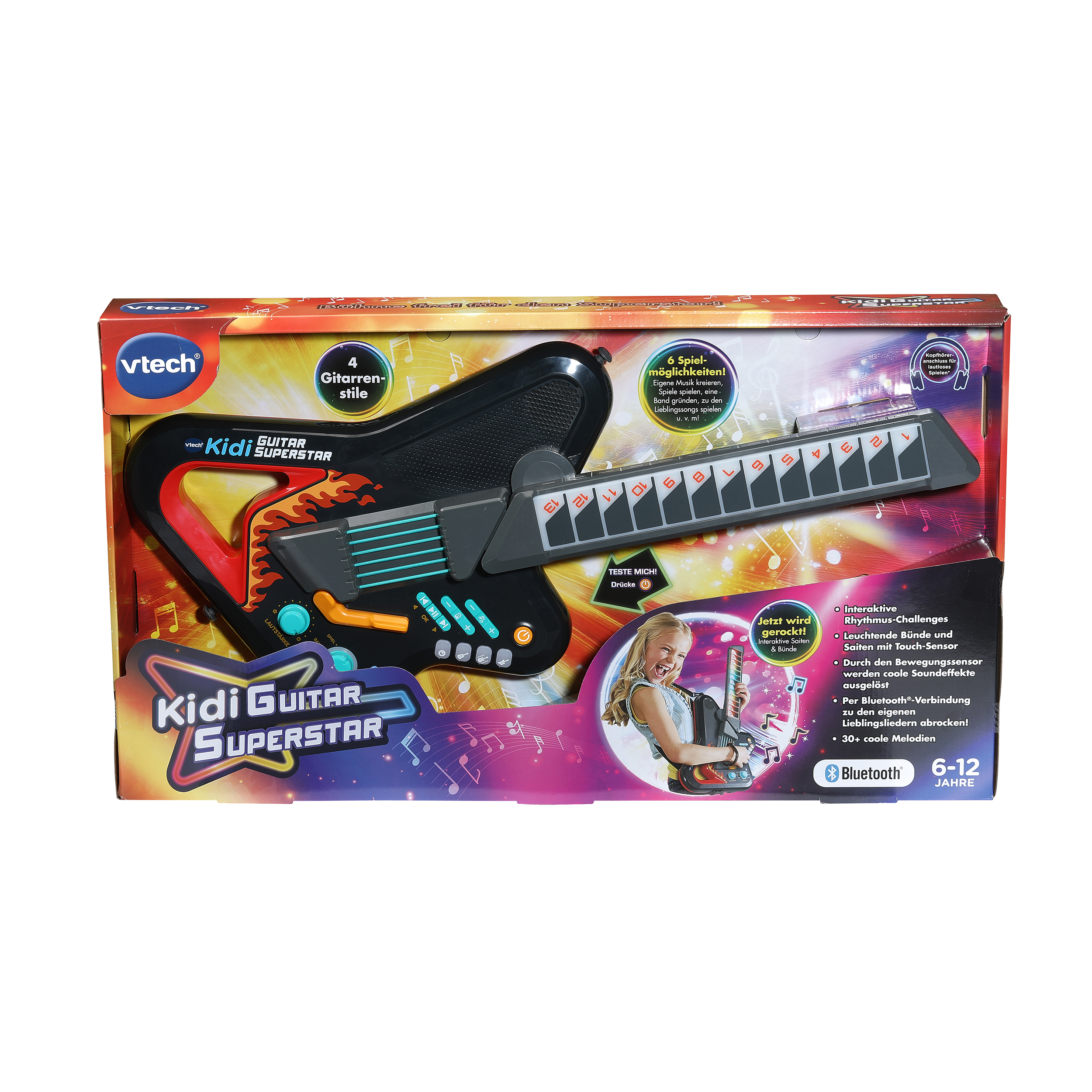 Verpackung der Vtech Kidi Guitar Superstar mit bunten Farben und Abbildungen einer spielenden jungen Gitarristin.