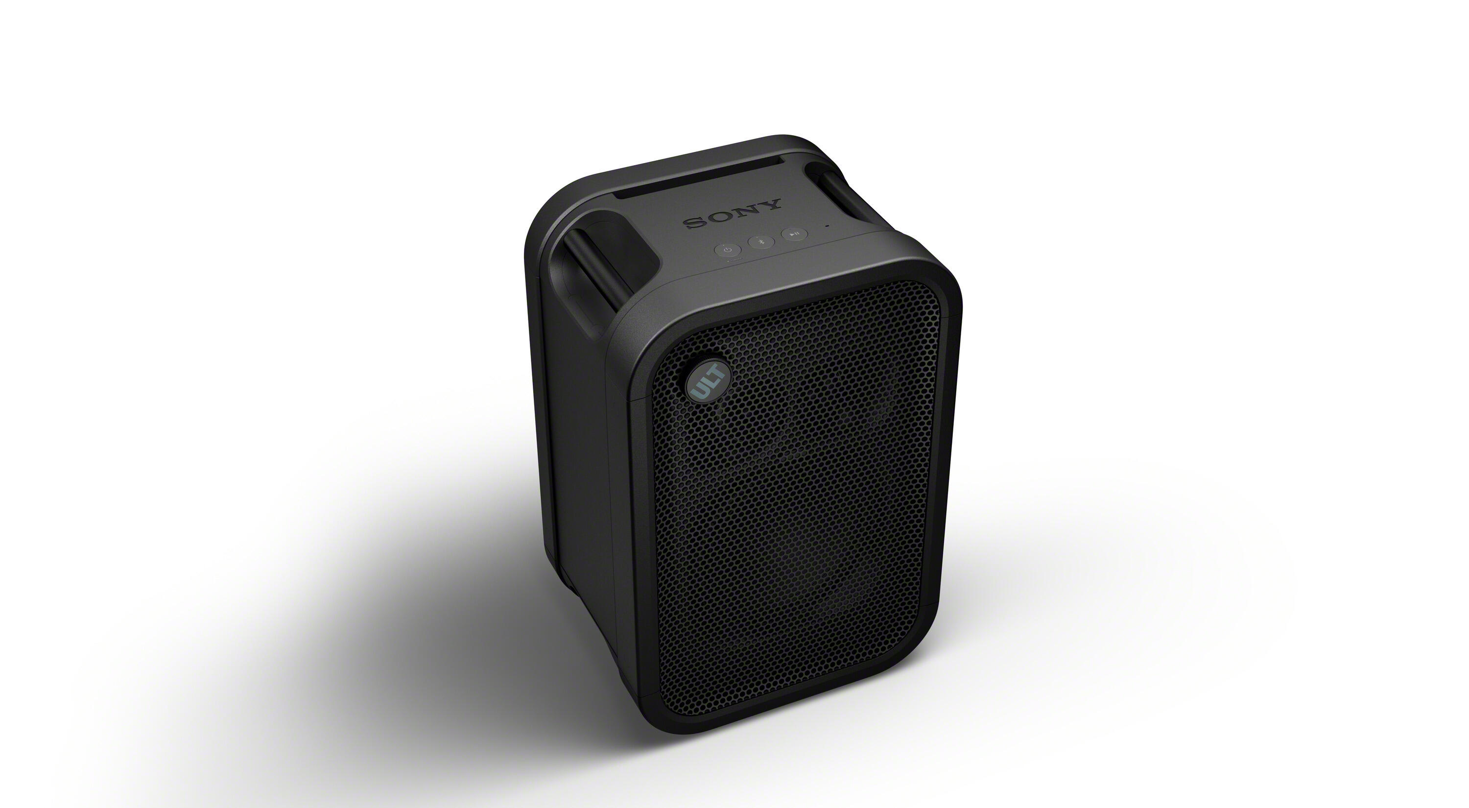 Un altavoz portátil Sony negro con rejilla de malla y botones de control en la parte superior.