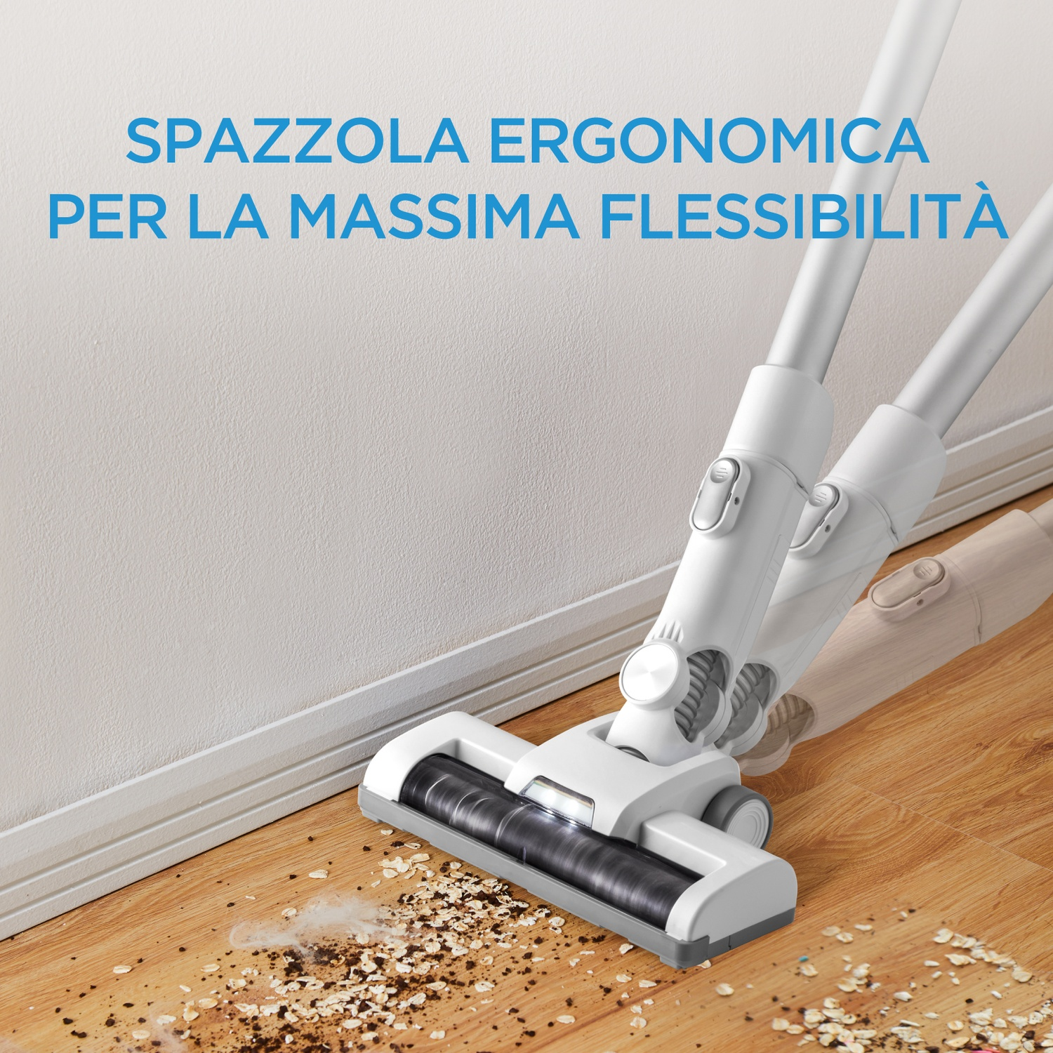 Un aspirapolvere bianco pulisce sporco e fiocchi d'avena su pavimento.