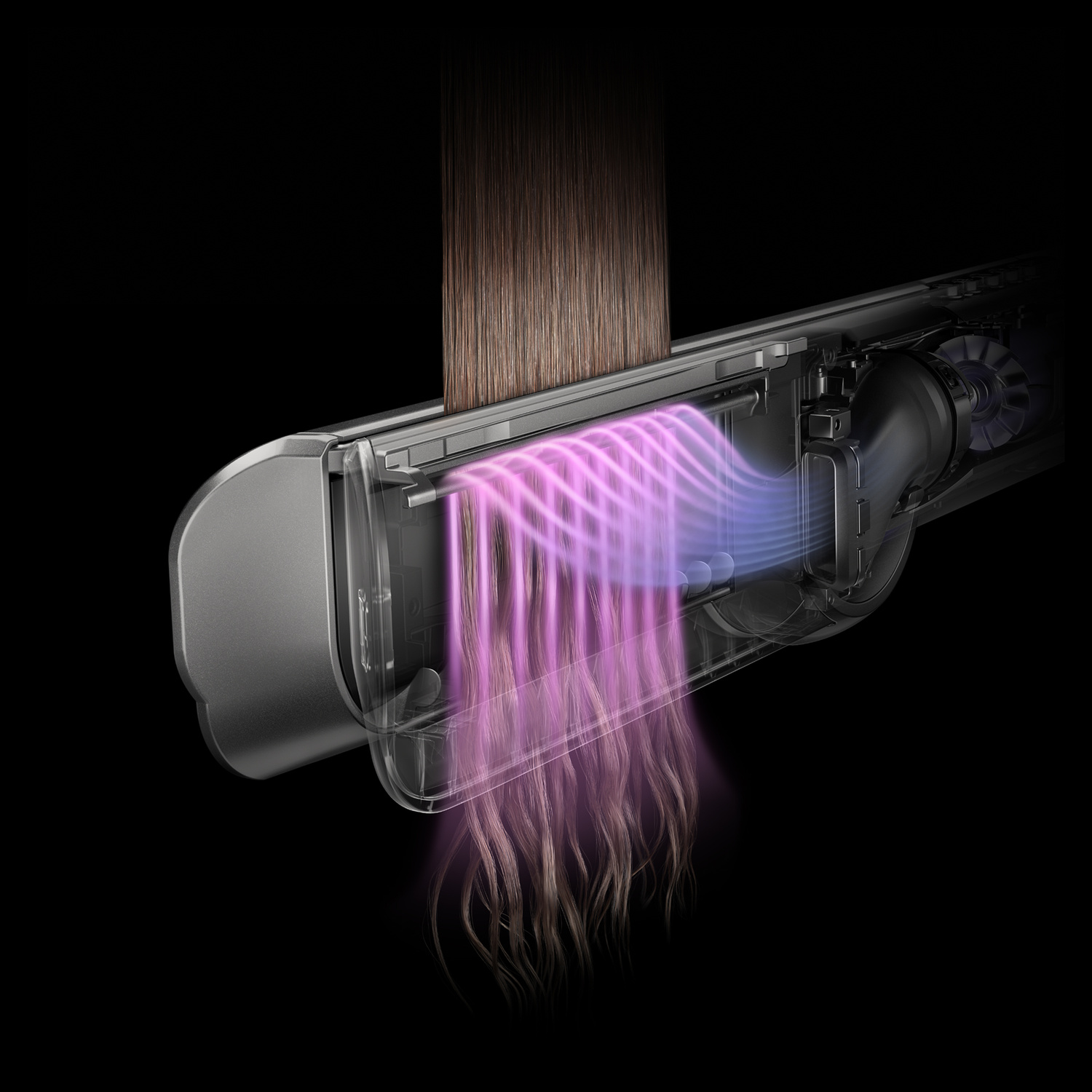 Primo piano di uno styler per capelli che mostra il flusso d'aria che liscia i capelli castani.