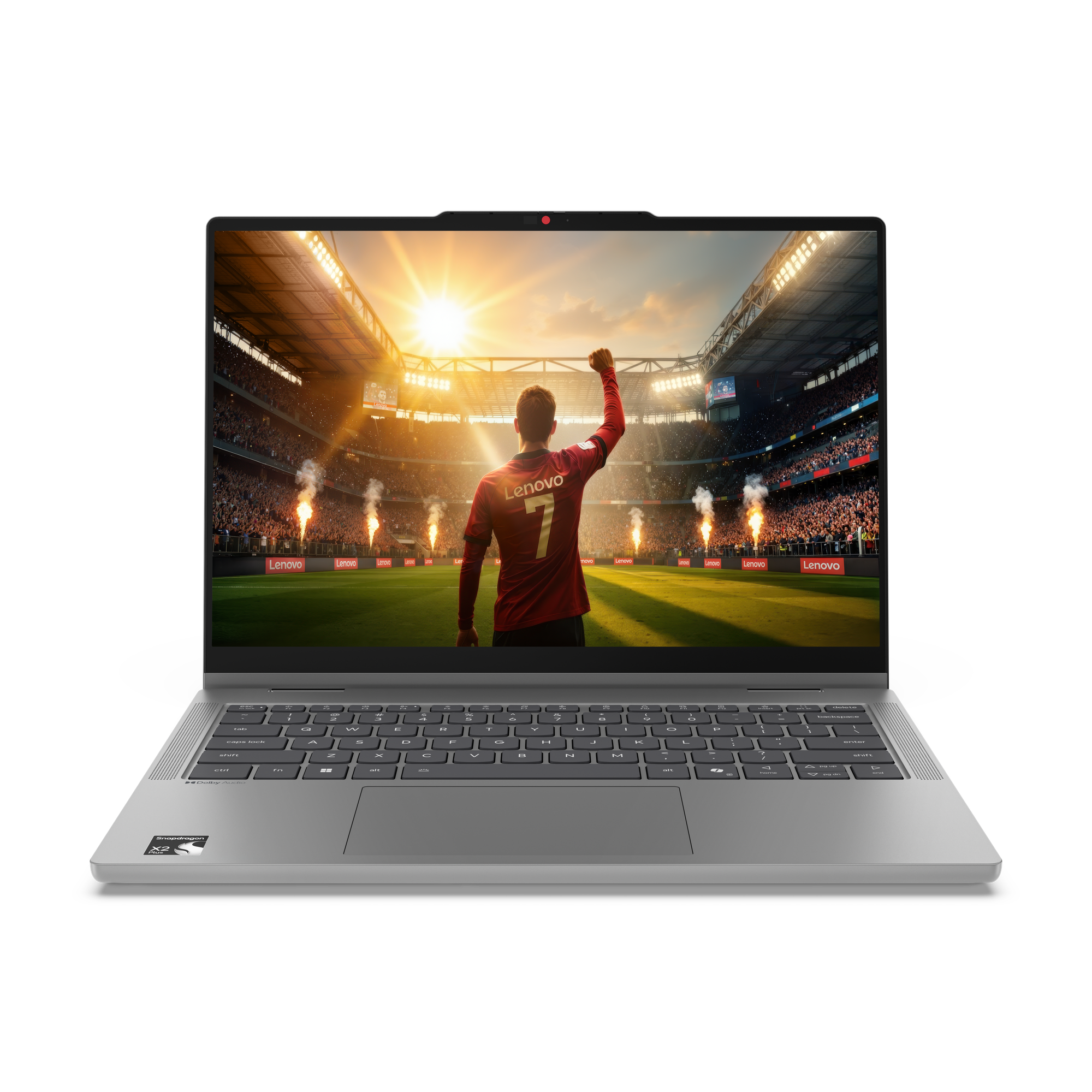 Ein silberner Laptop zeigt auf dem Bildschirm ein Fußballspiel in einem hell erleuchteten Stadion mit einem jubelnden Spieler.