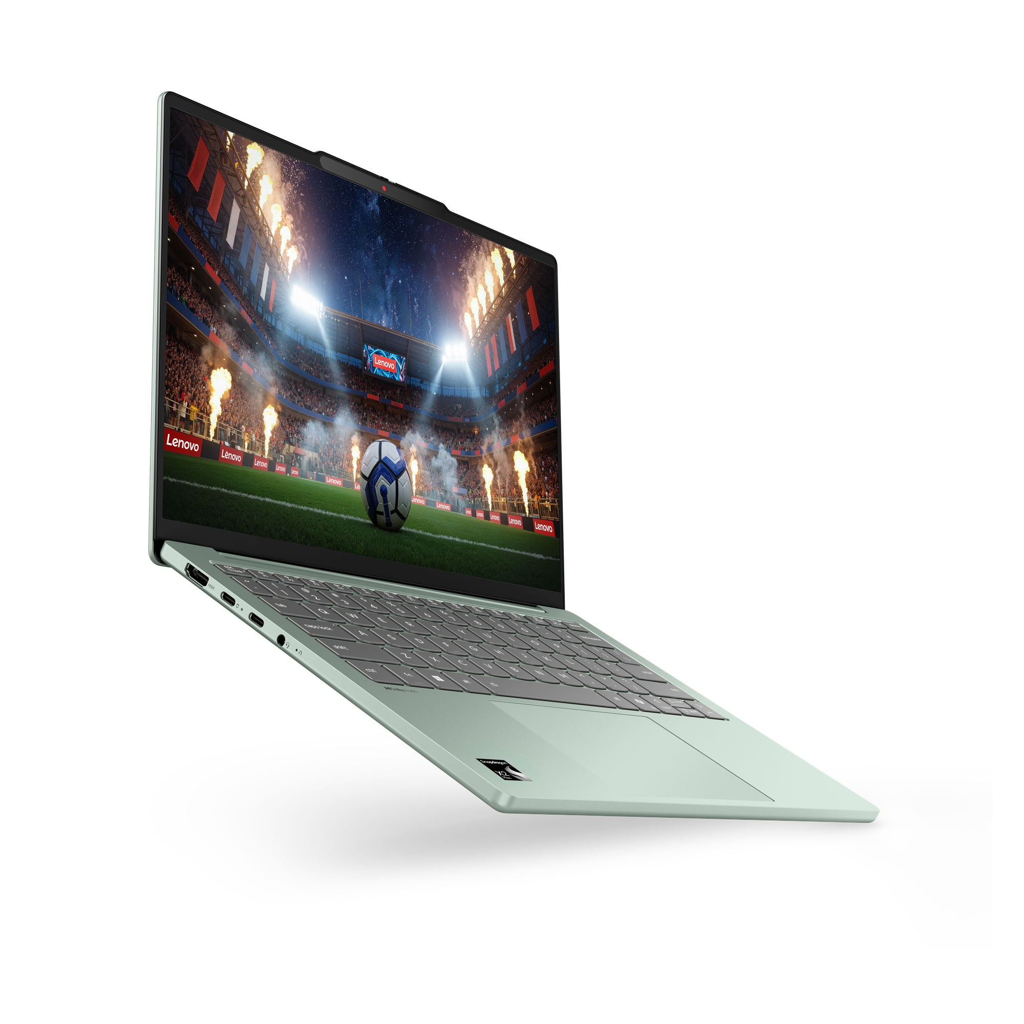 Ein hellgrüner Laptop vor schwarzem Hintergrund zeigt ein leuchtendes Fußballstadion auf dem Bildschirm.