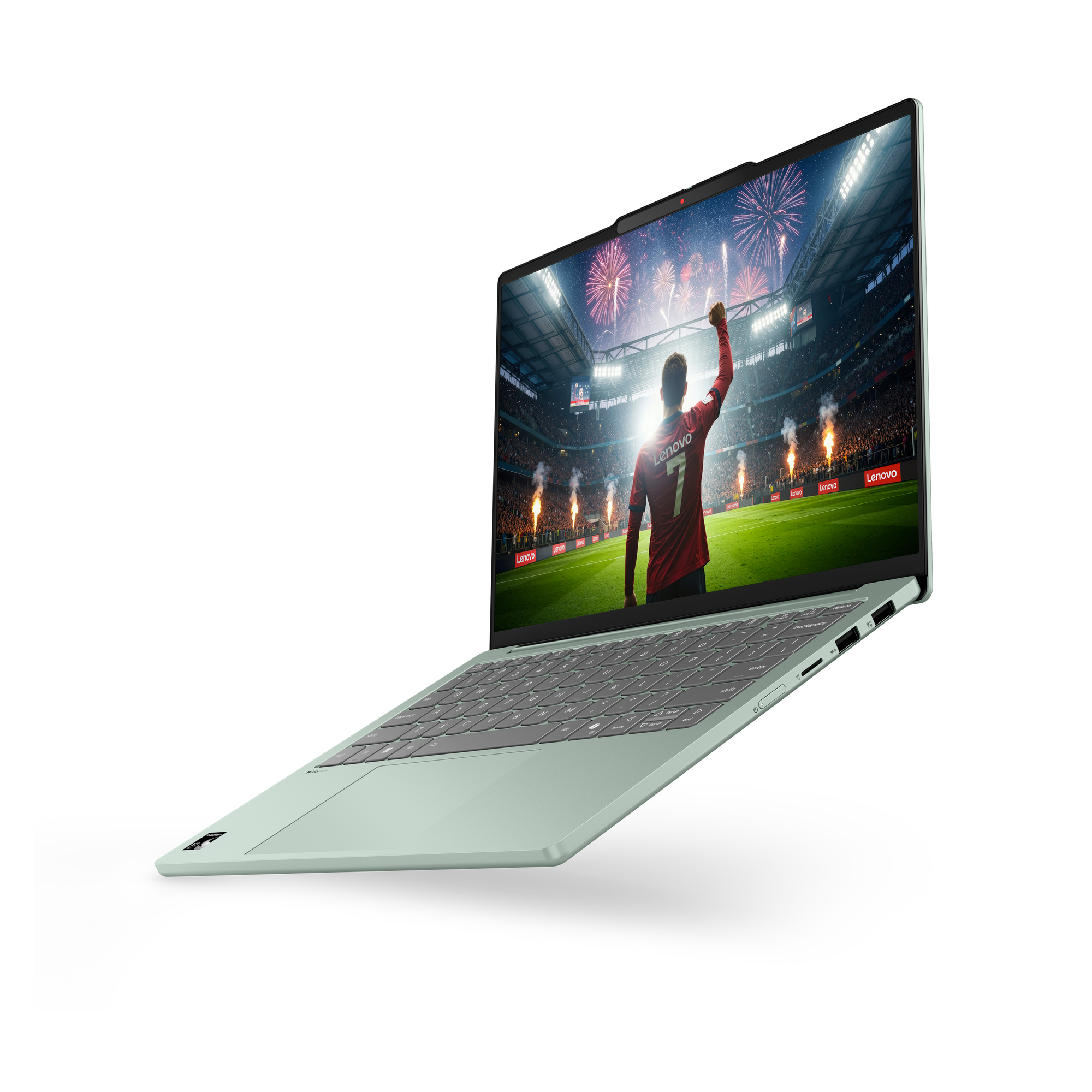 Ein hellgrüner Laptop schwebt vor schwarzem Hintergrund und zeigt ein Fußballspiel im Stadion mit Feuerwerk.
