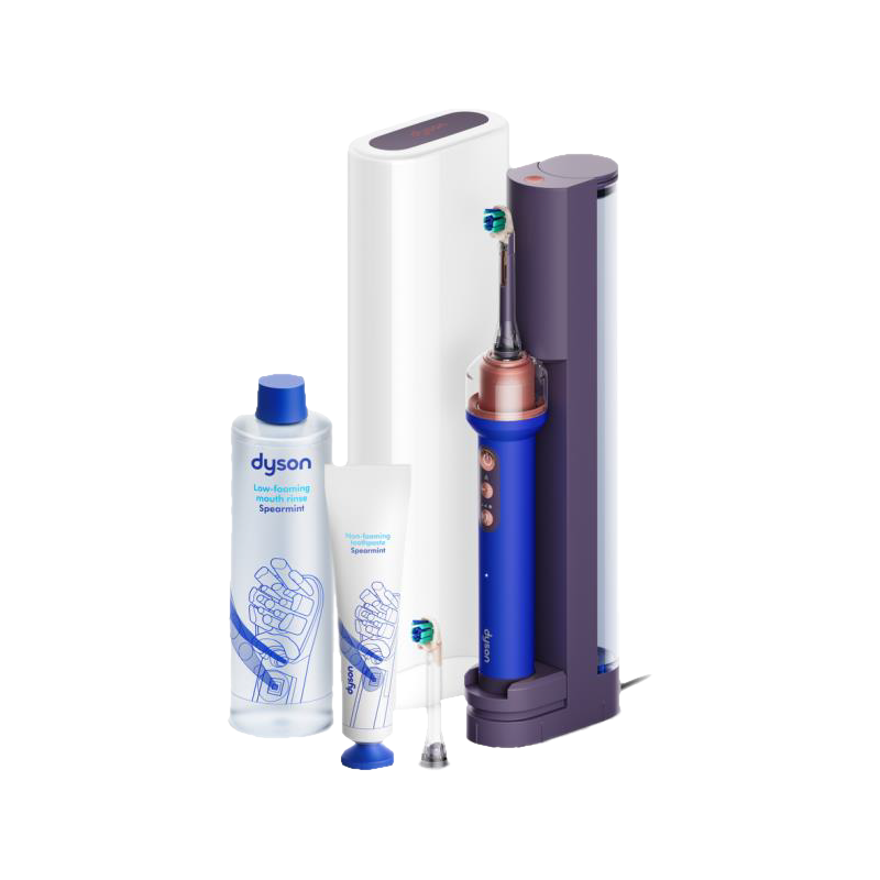Un kit de soins dentaires Dyson avec brosse à dents électrique bleue, bain de bouche et dentifrice.
