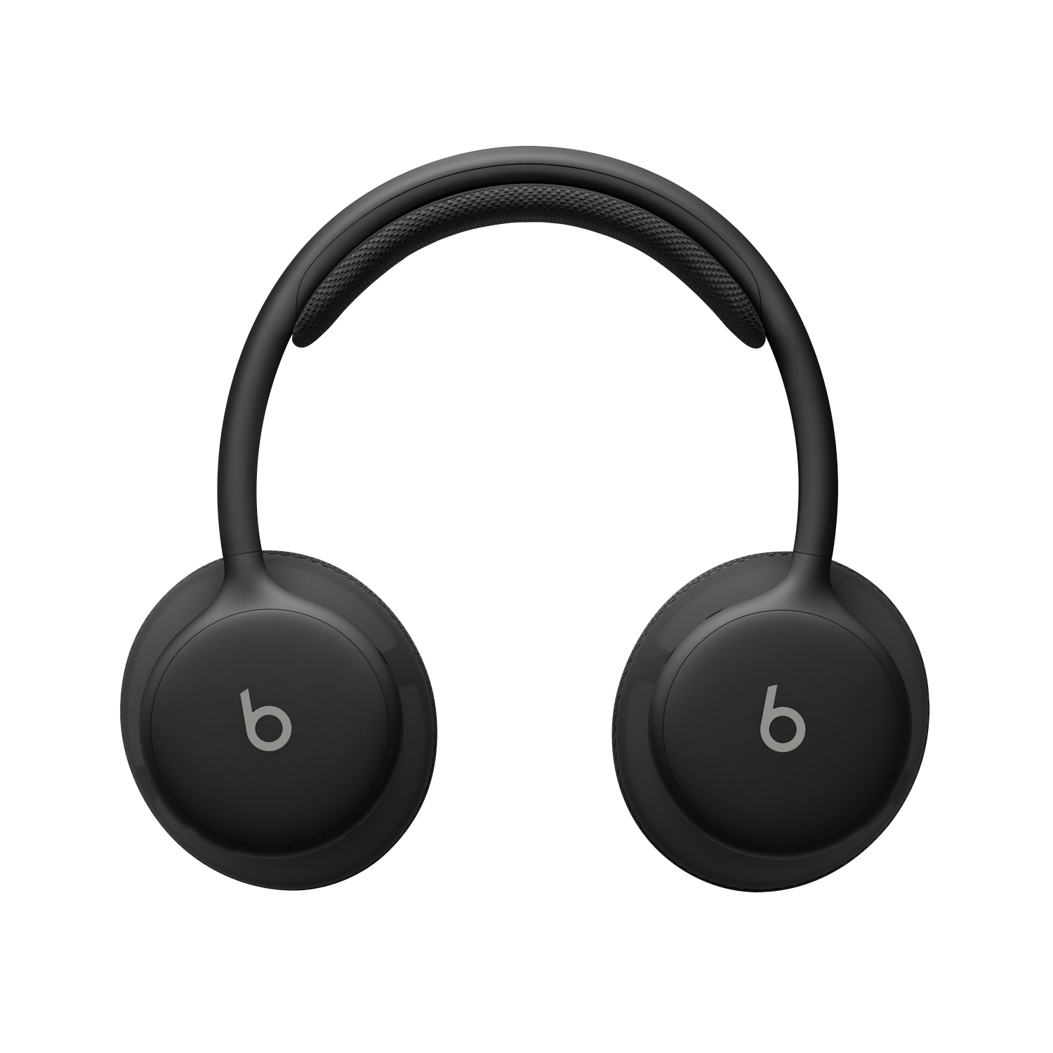 Auriculares Beats negros con copas redondeadas y el logo de la marca sobre fondo negro.