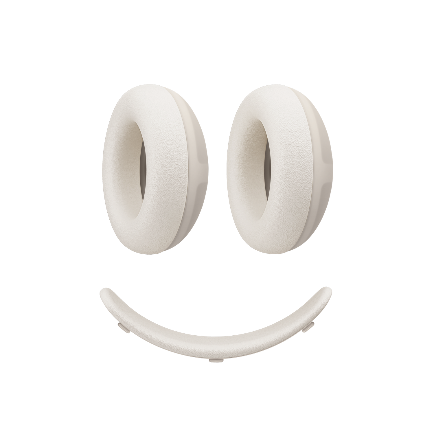 Dos cojines de auriculares blancos y una diadema forman una cara sonriente sobre fondo negro.