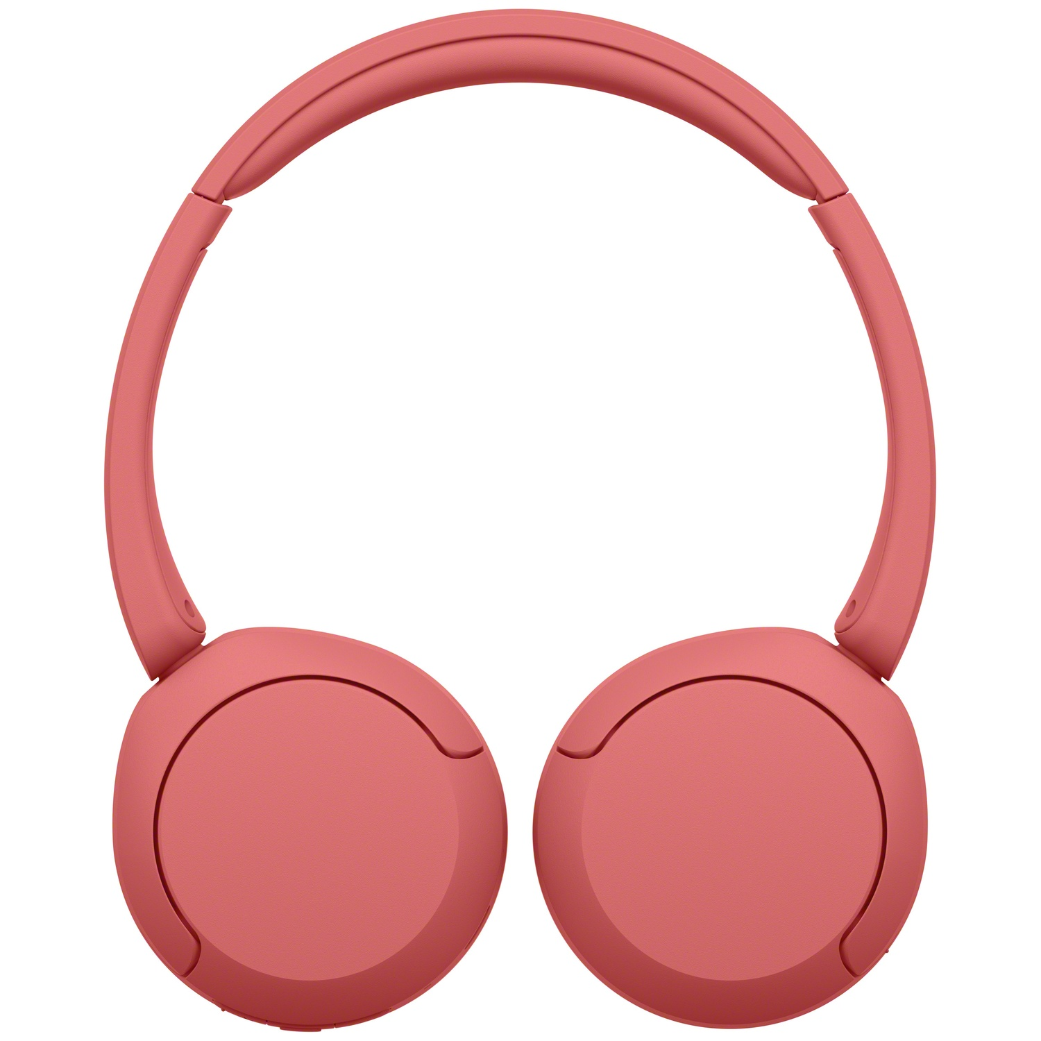 Casque supra-auriculaire sans fil rose sur fond blanc.
