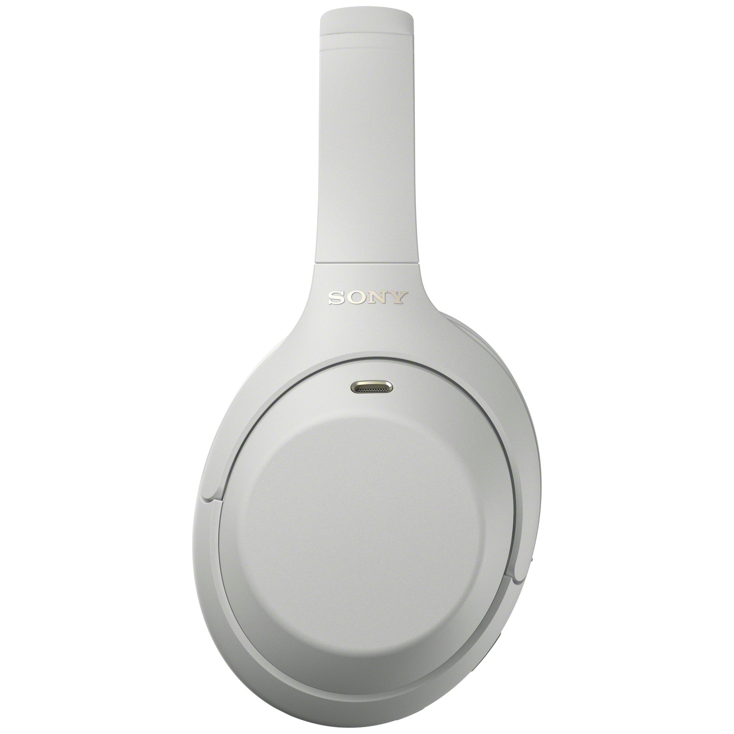 Casque sans fil Sony gris avec un port USB-C sur fond blanc.