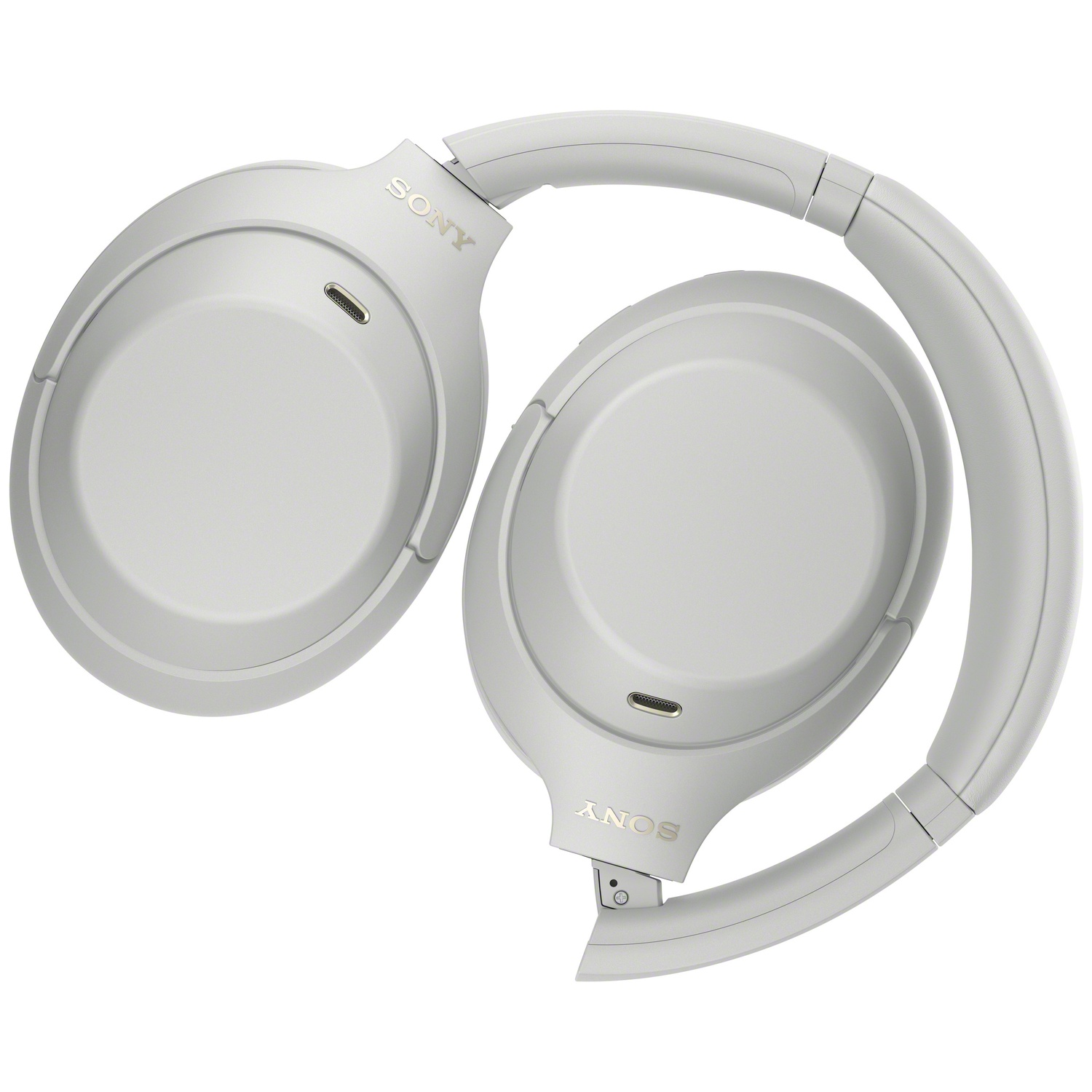 Casque supra-auriculaire blanc de Sony avec arceau et microphones sur fond blanc.