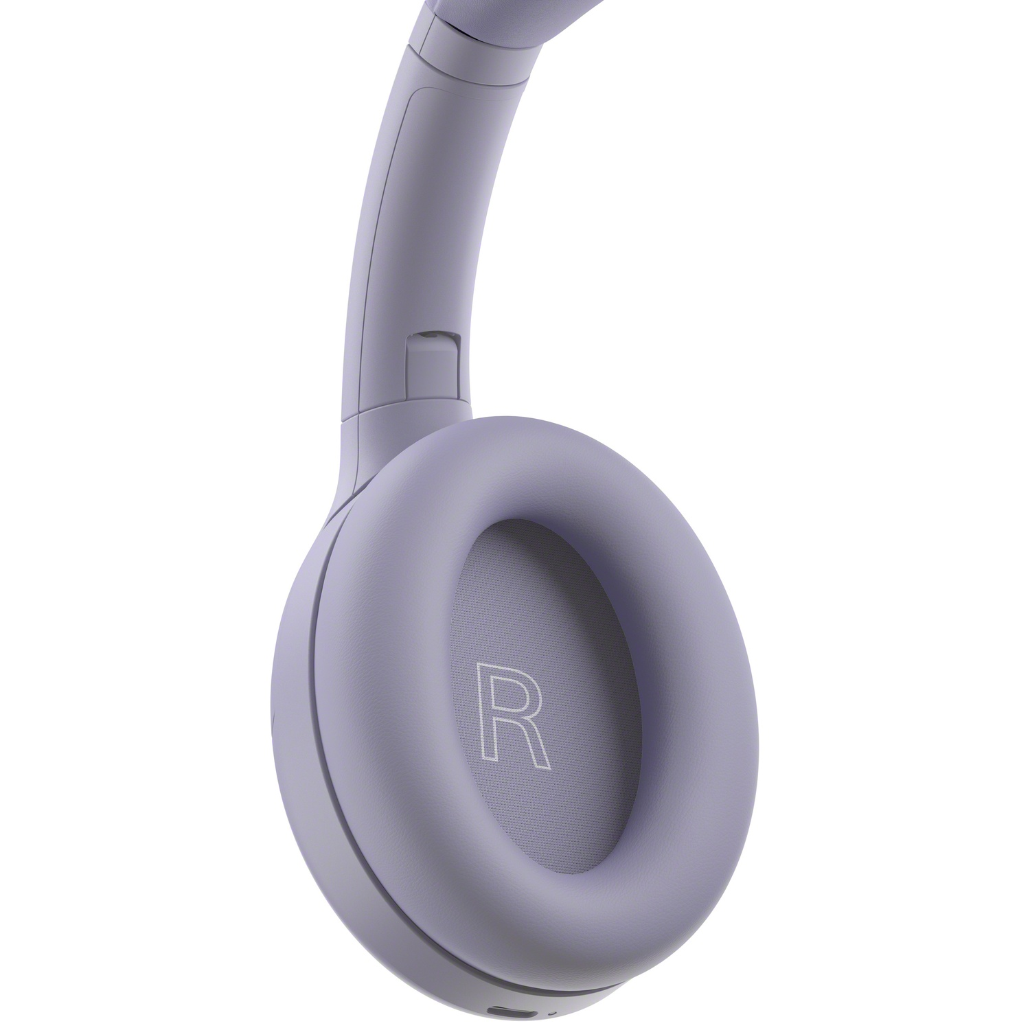 Casque supra-auriculaire violet avec un 'R' sur l'écouteur droit sur fond blanc.