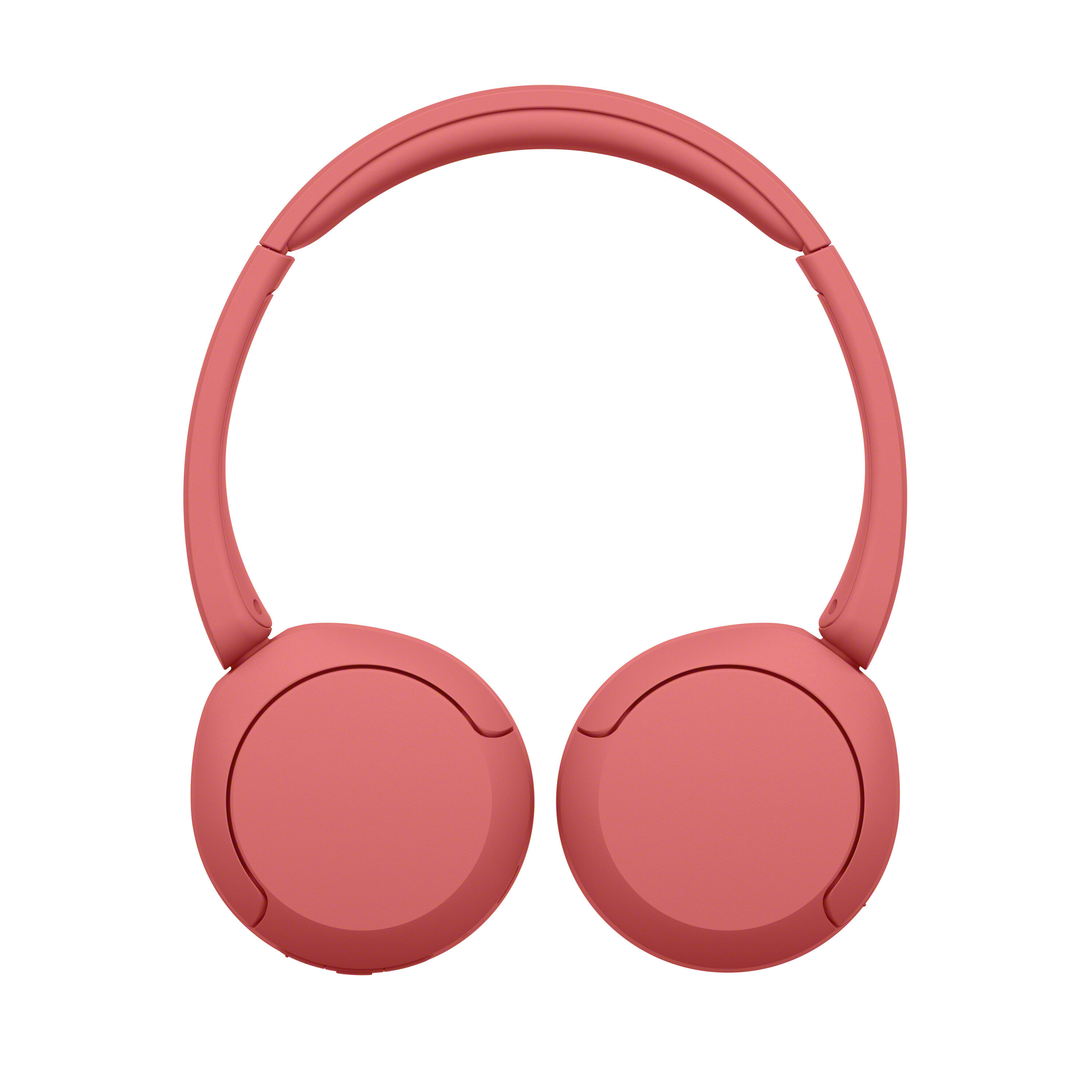 Auriculares supraaurales rojos sobre un fondo blanco.