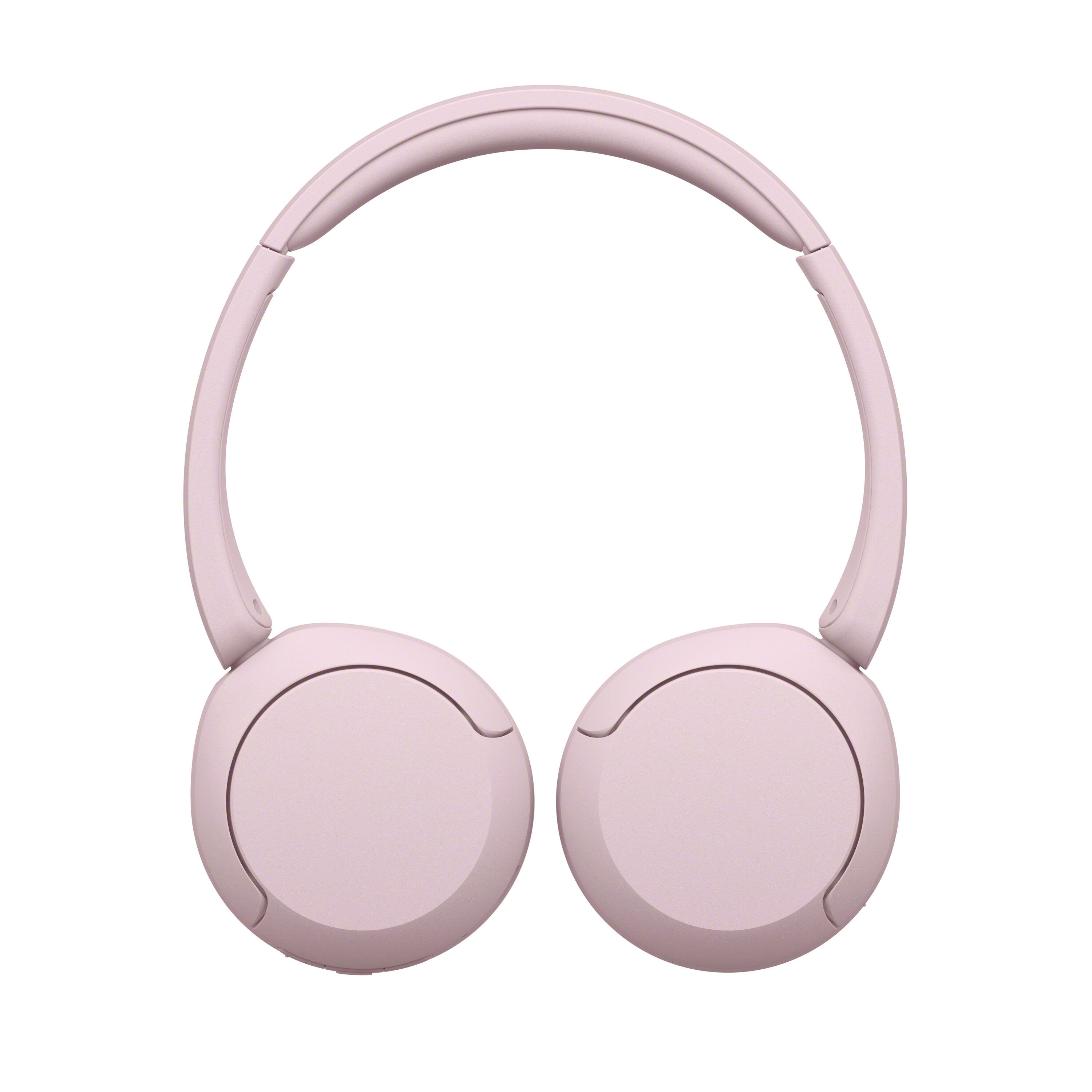 Auriculares supraaurales modernos de color rosa sobre fondo blanco.