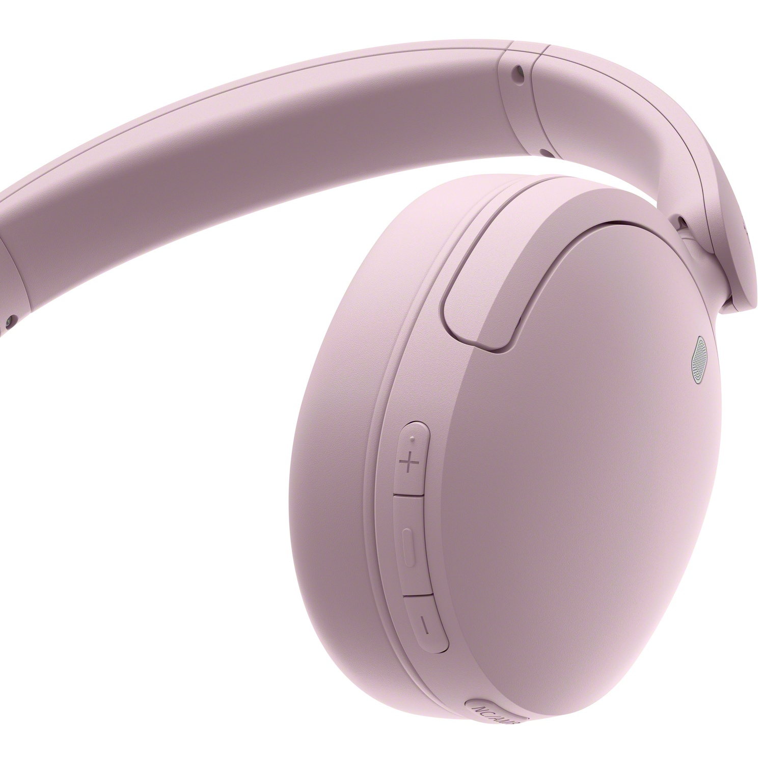 Casque sans fil rose avec boutons de commande sur l'écouteur sur fond blanc.