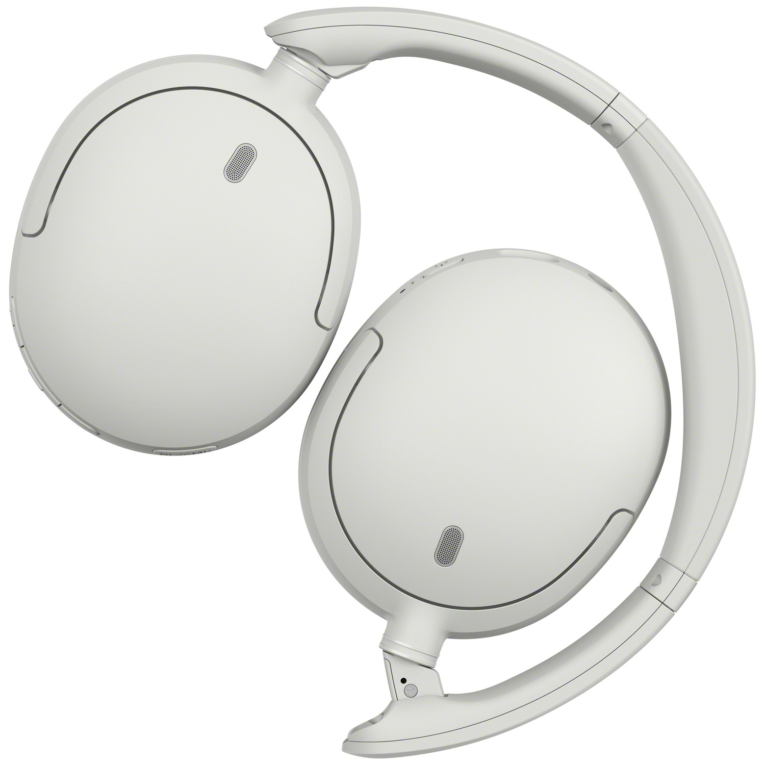 Une paire de casque audio blanc à plat sur fond blanc.
